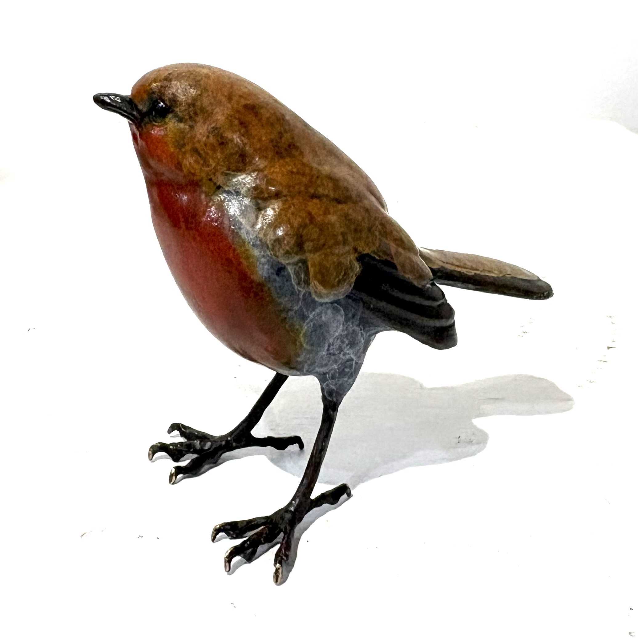 Robin by Steve Langford is a beautiful life size sculpture of a Robin made of solid bronze.