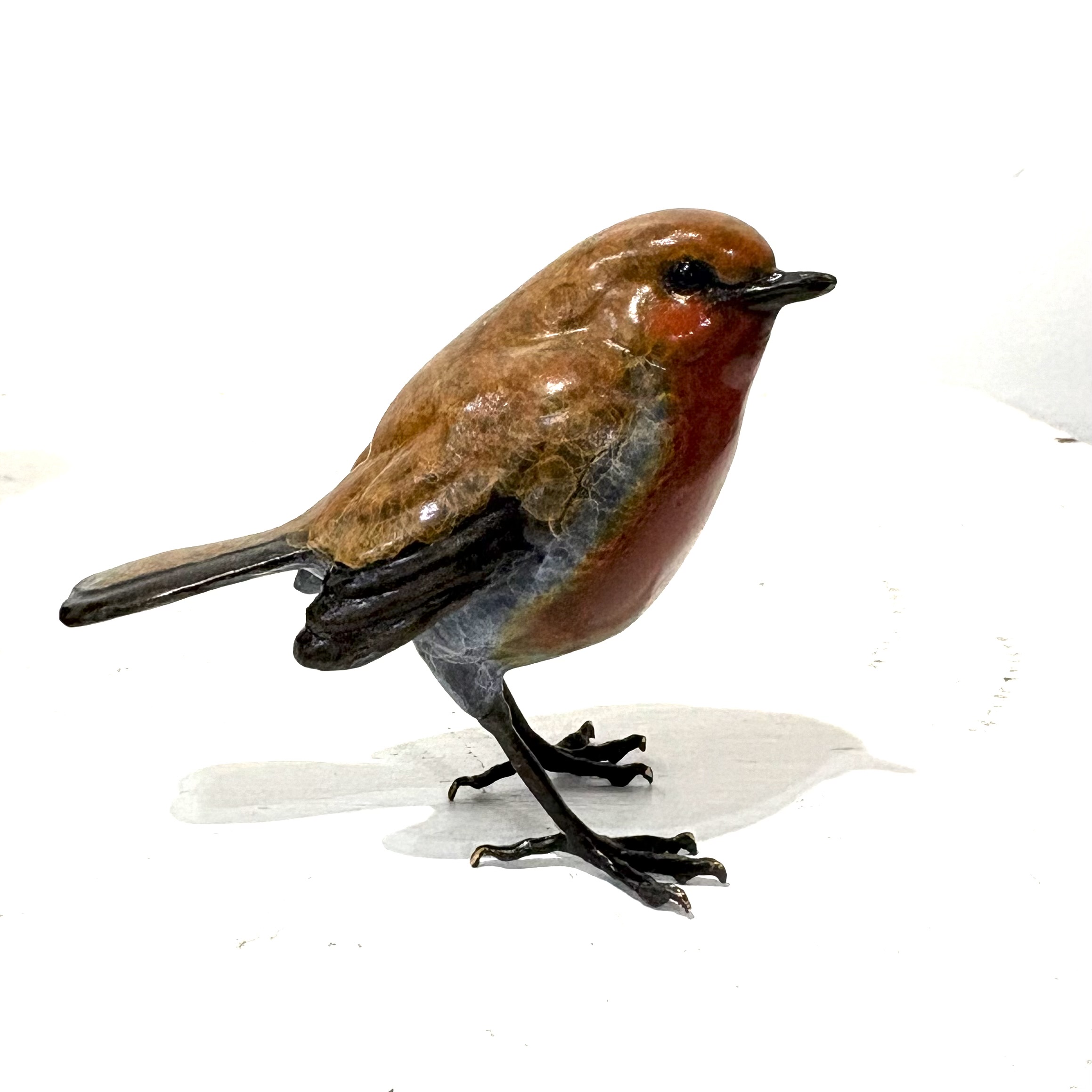 Robin by Steve Langford is a beautiful life size sculpture of a Robin made of solid bronze.