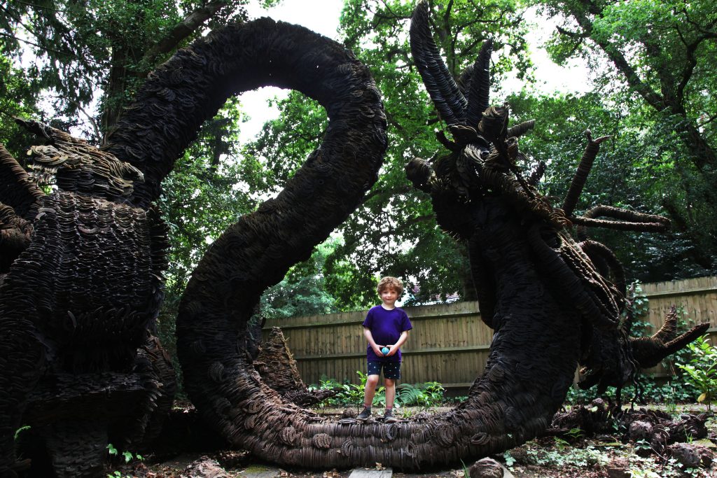 Final Throes of Dragon Tableaux (Horseshoe Dragon) by Jim Poolman is a Fantasy sculpture made from 50,000 horseshoes. A monumental outdoor display