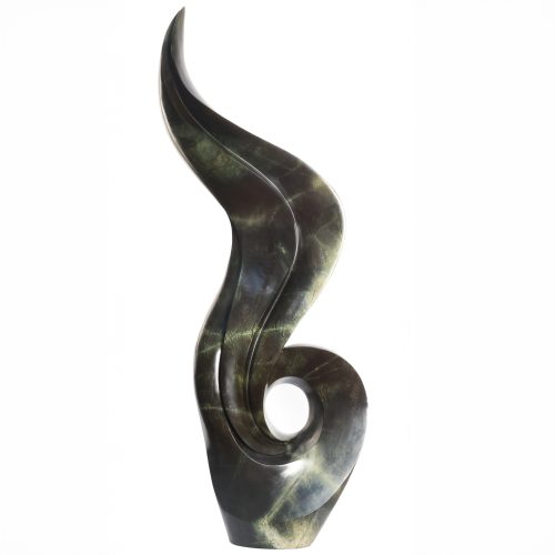 Fire in the Wind by Mishek Nyamapfeka. Unique, abstract Shona sculpture made from avocado stone. The dark coloured stone has been carved into a flame like shape.