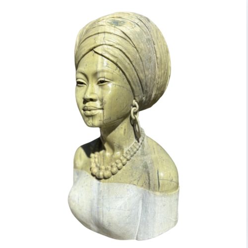 African Beauty by Farai Mangenda. Figurative Butter Jade Shona stone sculpture bust of an African woman. She wears a bead necklace, hoop earrings and a head wrap.