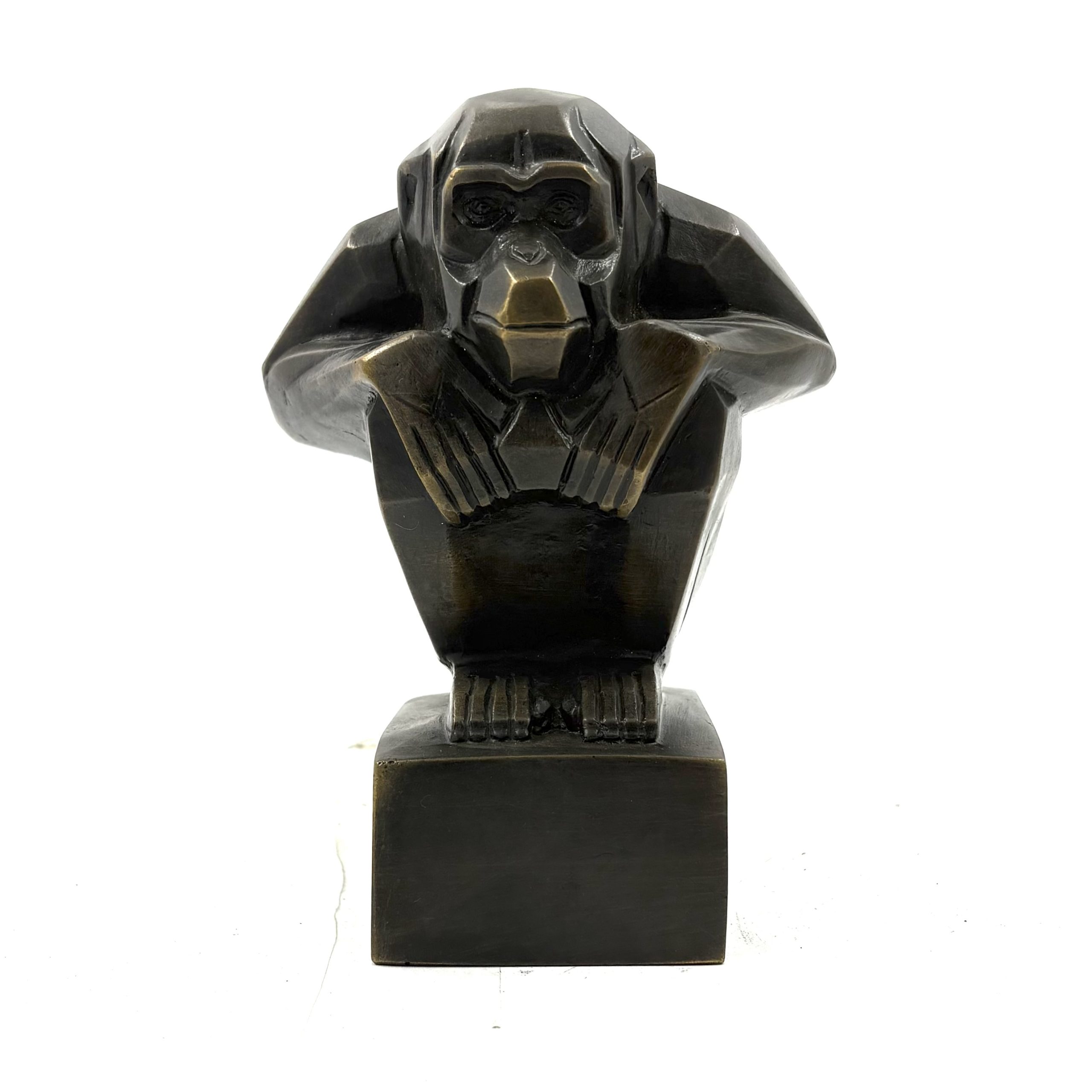 Art Deco Monkey is a small bronze monkey in a crouching position with his hands resting on his knees