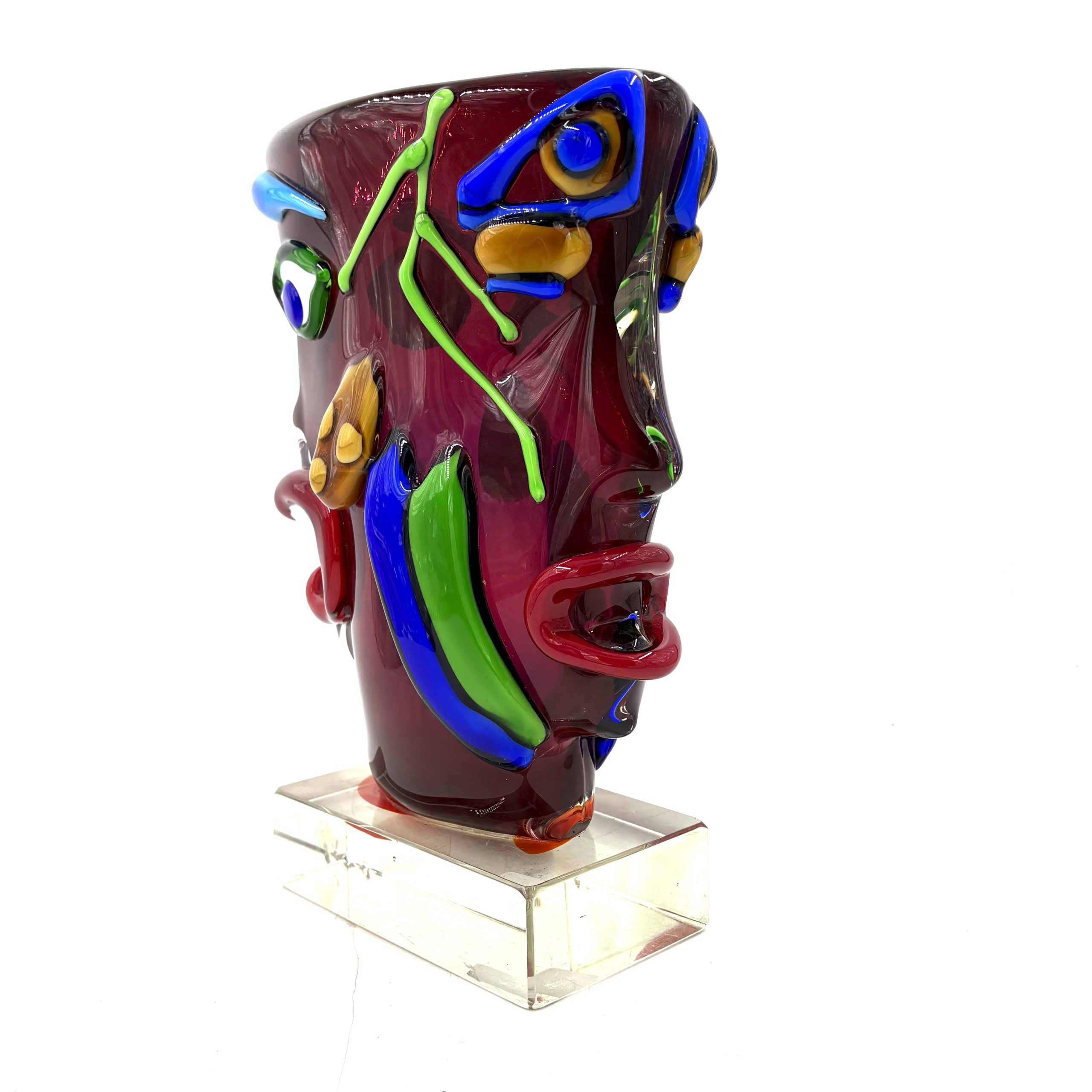 Homage to Picasso by Sandro Frattin. Unique Murano glass vase in red, blue, green and yellow. The outside of the vase is formed into the shape of two simplistic human faces.