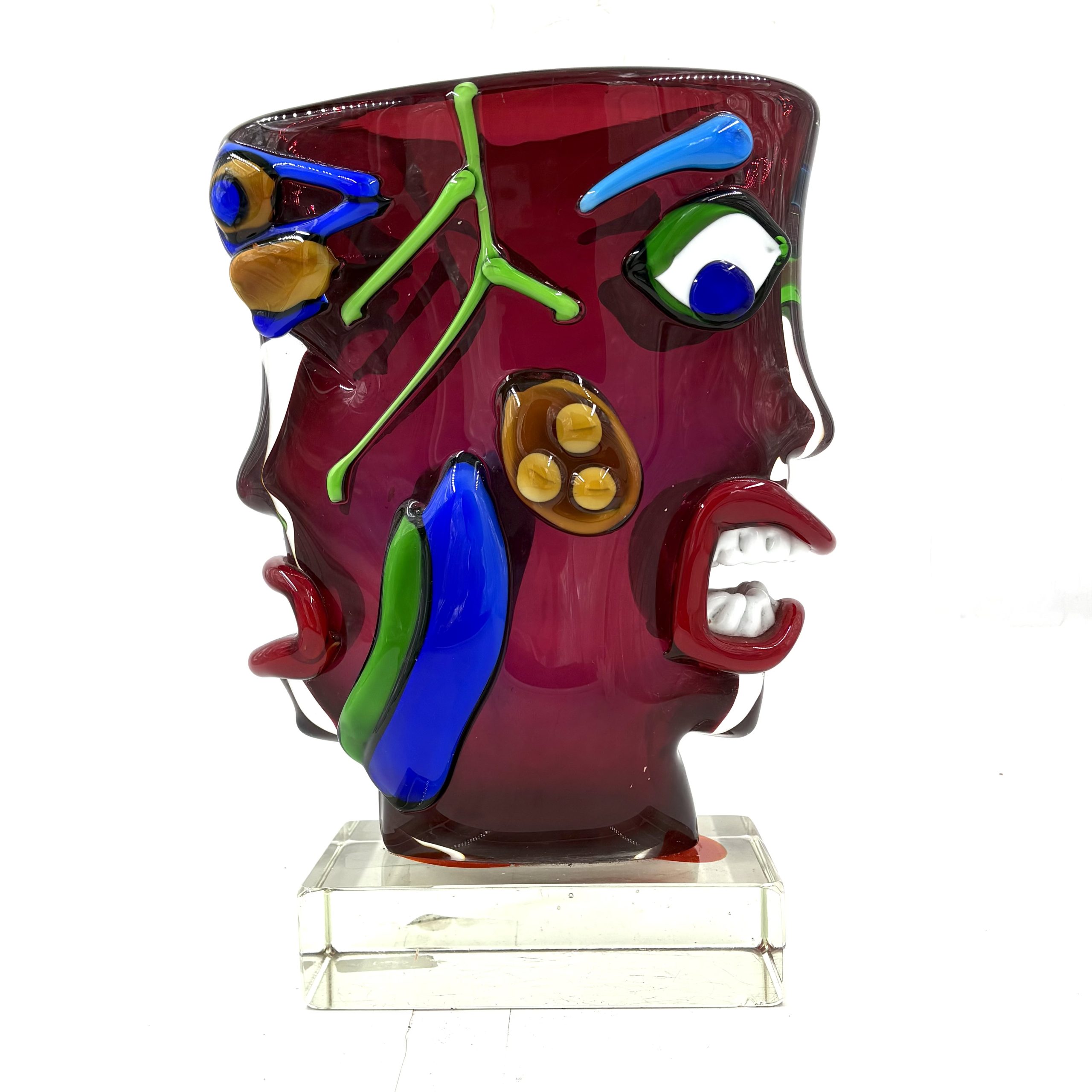 Homage to Picasso by Sandro Frattin. Unique Murano glass vase in red, blue, green and yellow. The outside of the vase is formed into the shape of two simplistic human faces.