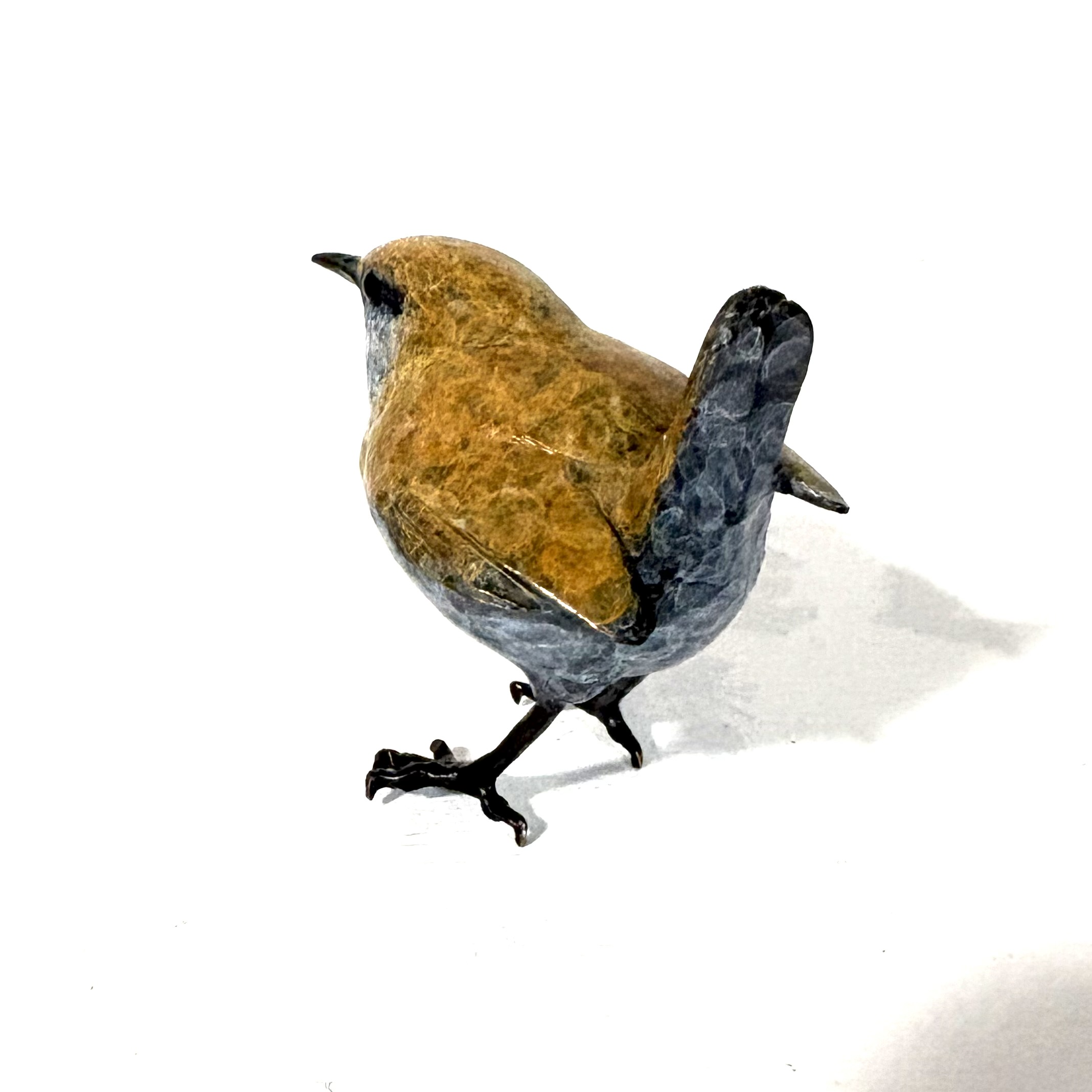 Lifesize Wren by Steve Boss. Small bronze sculpture of one of Britain's smallest birds by the reknowned artist Steve Boss.