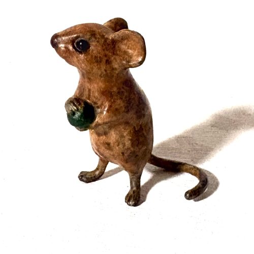 Mouse with pea by Steve Boss is a miniature bronze sculpture that depicts the mouse standing on rear legs and holding a pea.