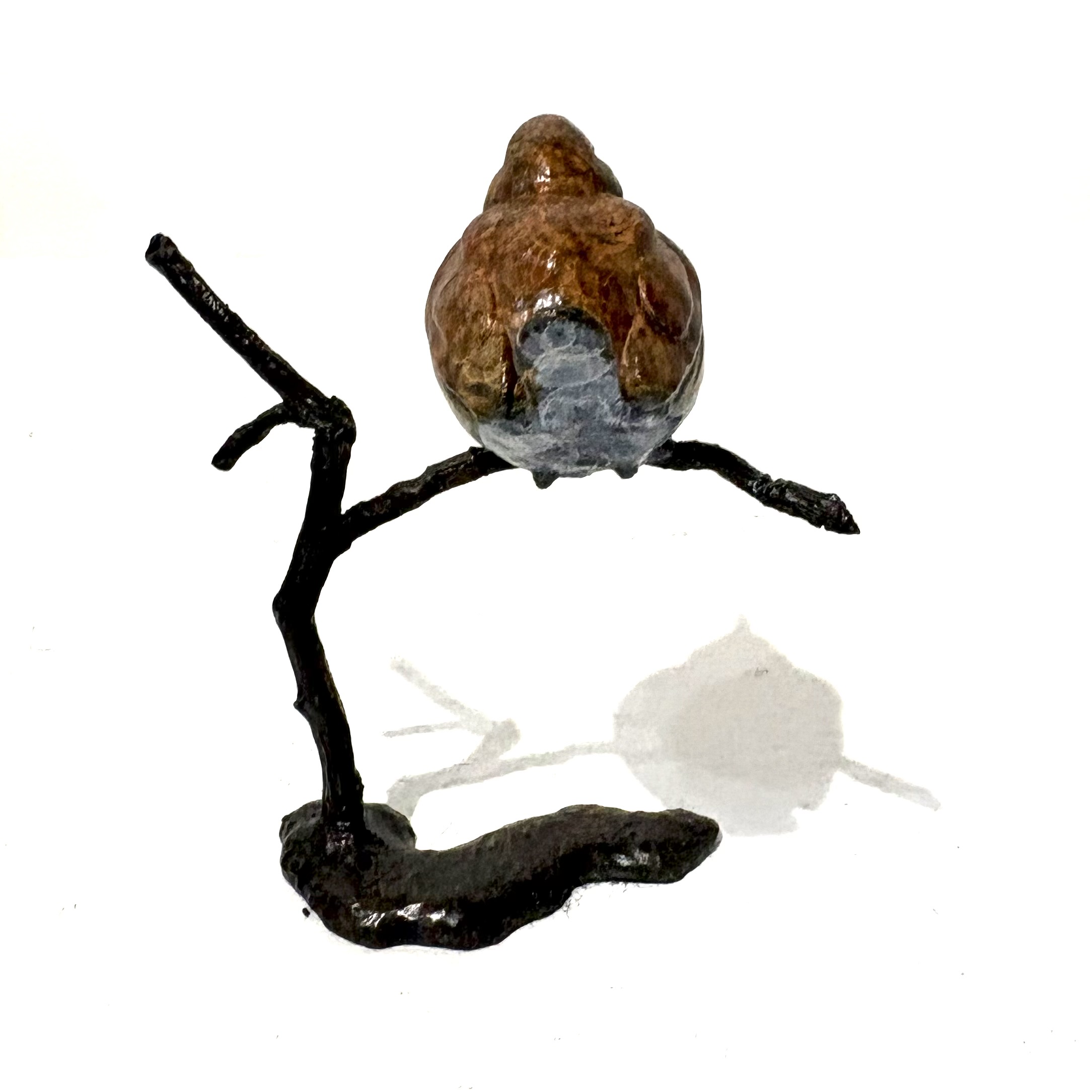 Robin on Branch by Steve Boss A delightful miniature bronze sculpture of a charming robin balanced on top of a tree branch.