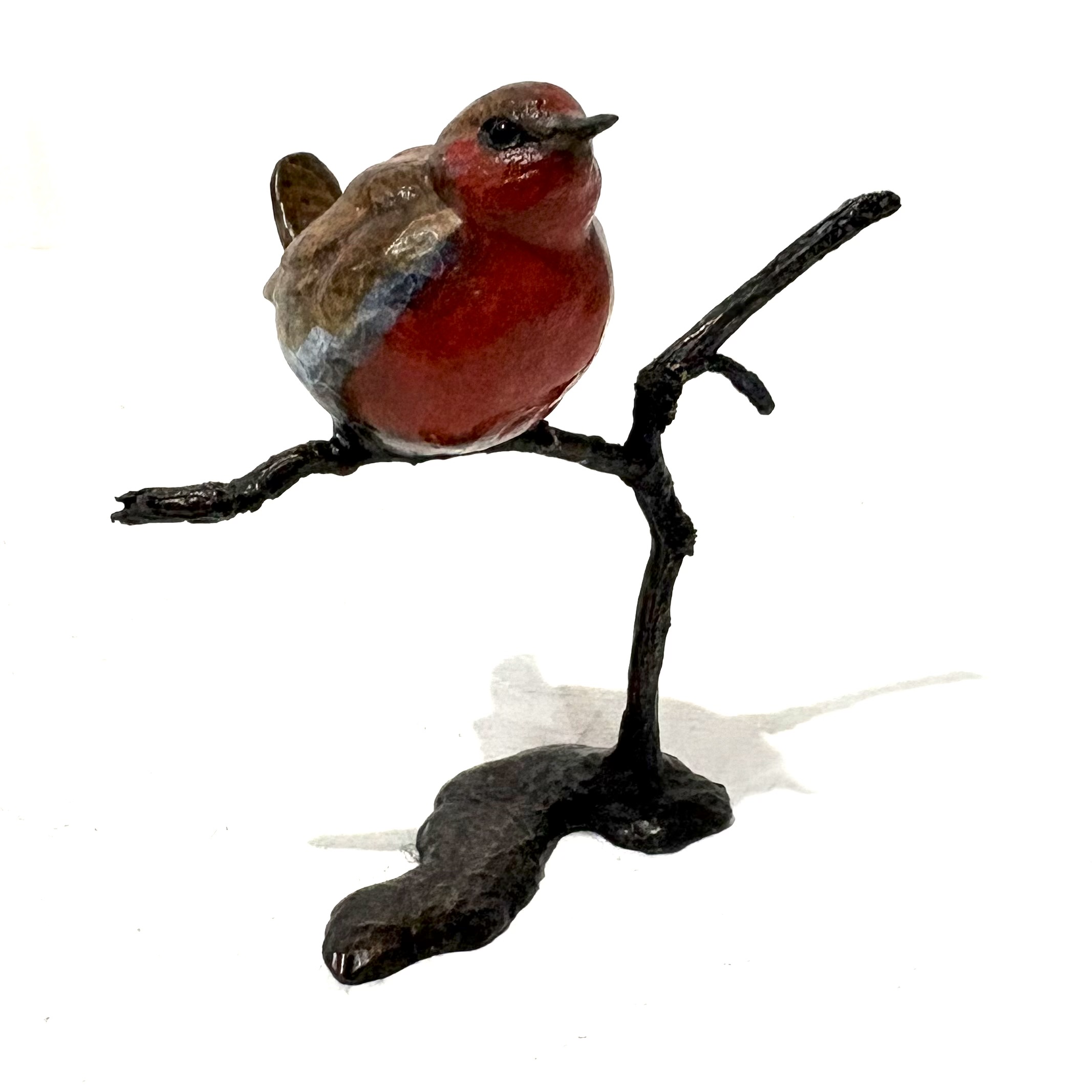 Robin on Branch by Steve Boss A delightful miniature bronze sculpture of a charming robin balanced on top of a tree branch.