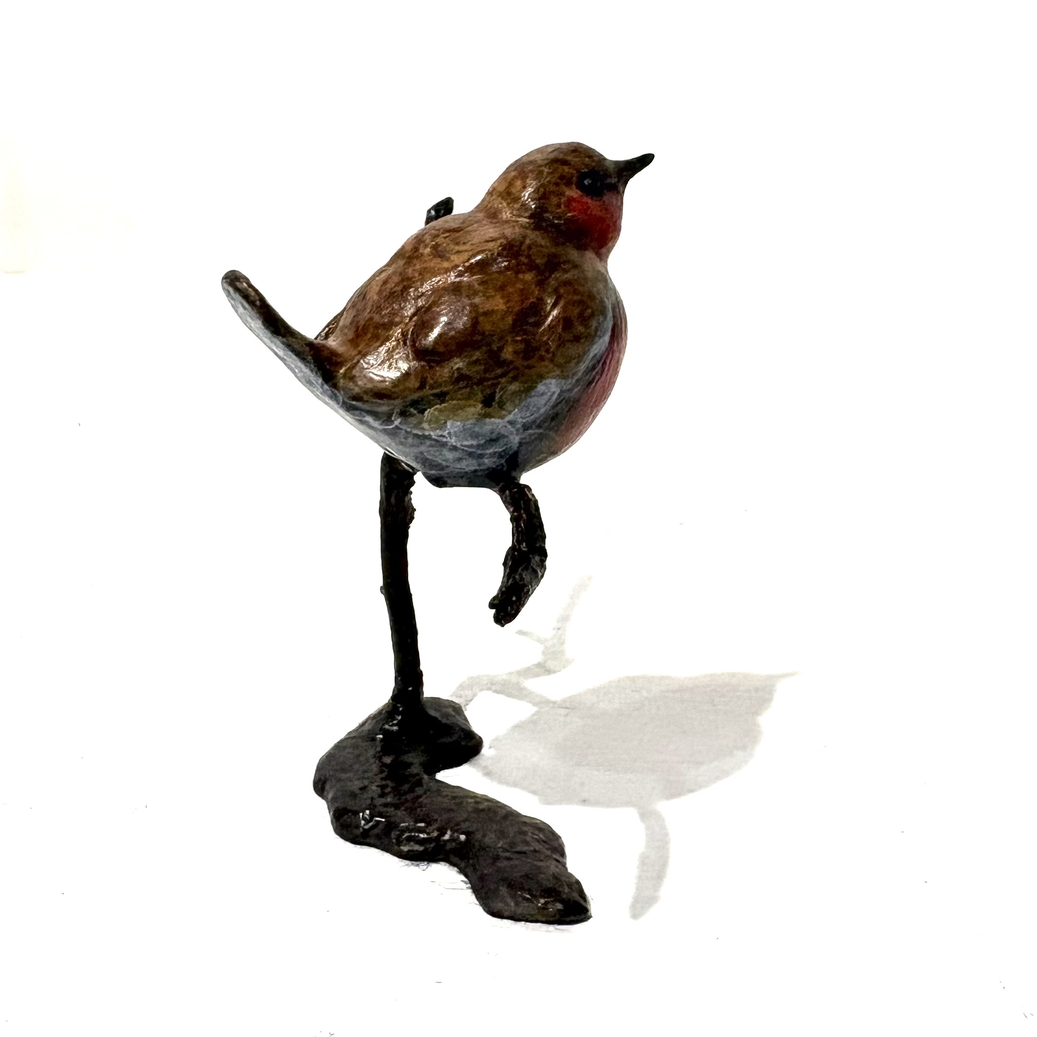 Robin on Branch by Steve Boss A delightful miniature bronze sculpture of a charming robin balanced on top of a tree branch.