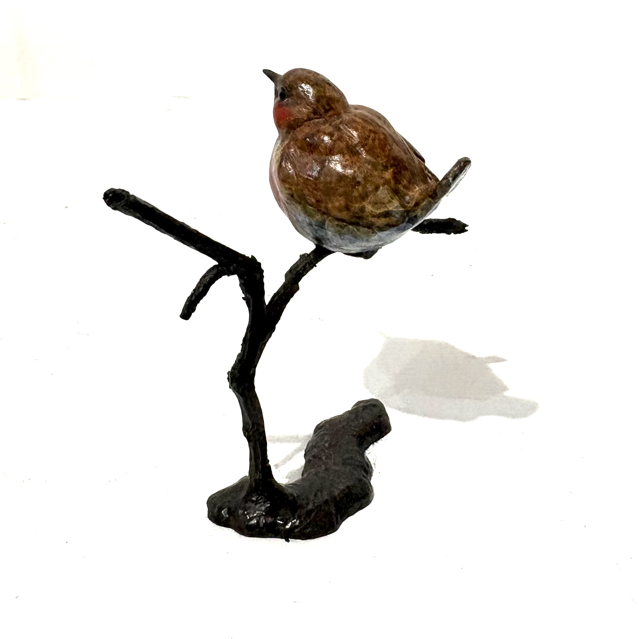 Robin on Branch by Steve Boss A delightful miniature bronze sculpture of a charming robin balanced on top of a tree branch.