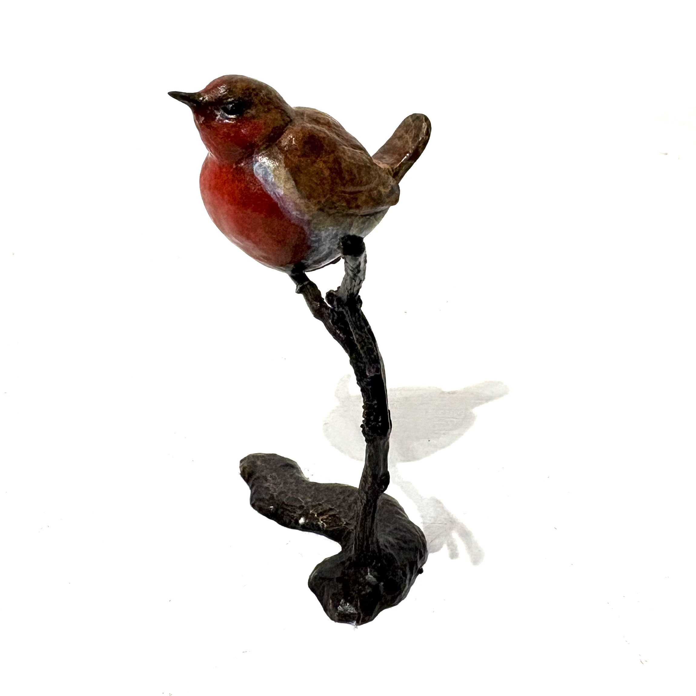Robin on Branch by Steve Boss A delightful miniature bronze sculpture of a charming robin balanced on top of a tree branch.