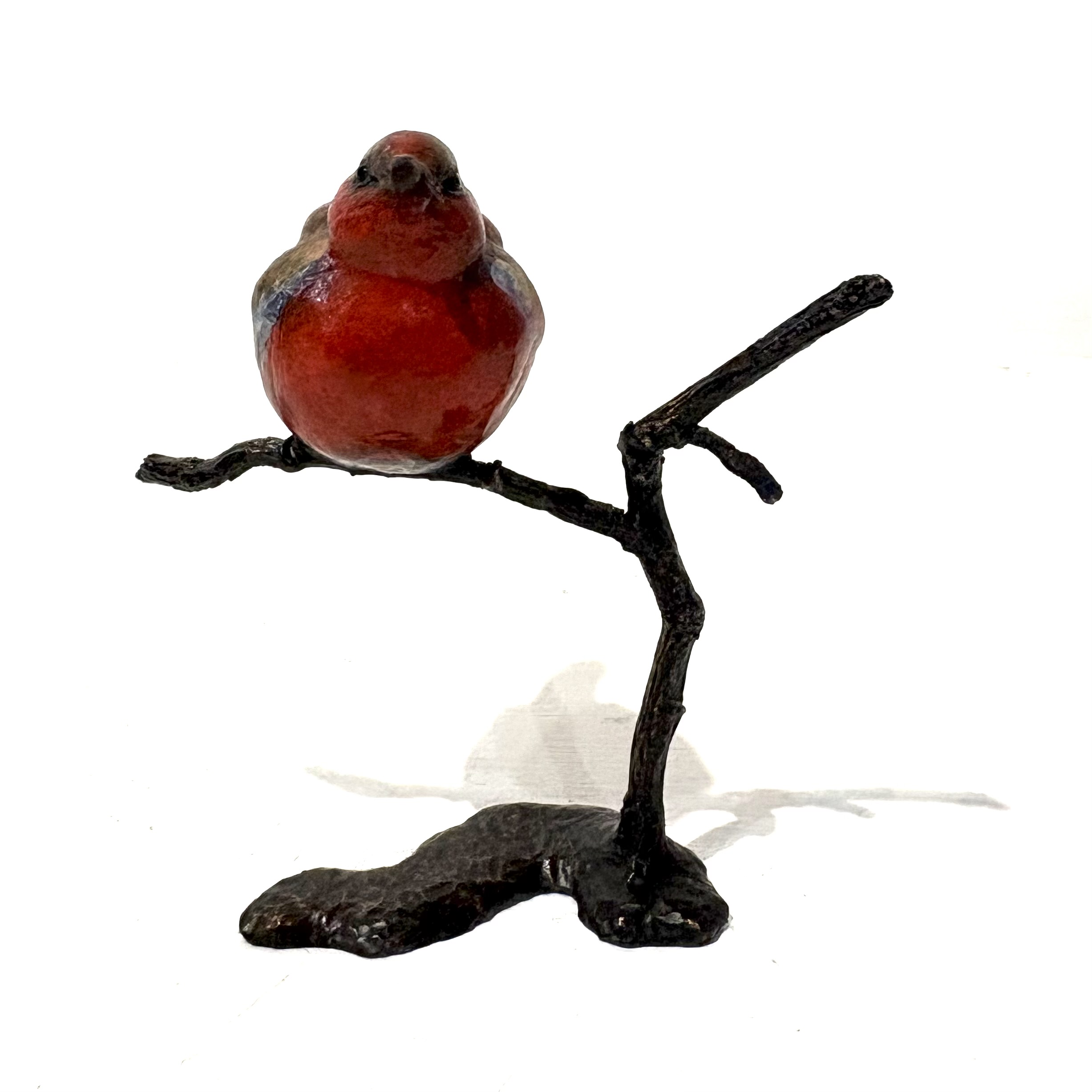 Robin on Branch by Steve Boss A delightful miniature bronze sculpture of a charming robin balanced on top of a tree branch.