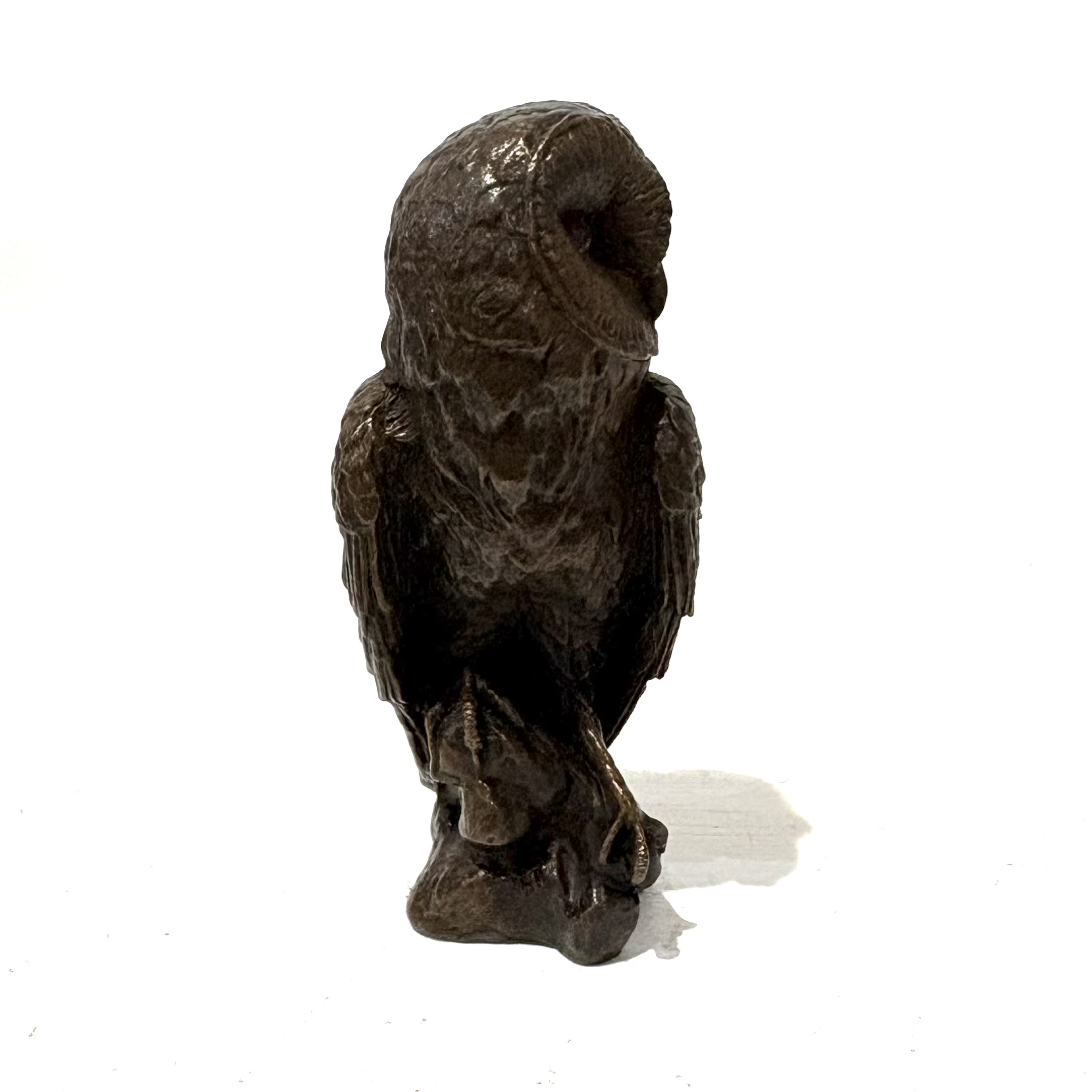 Barn Owl by Steve Langford. Small bronze bird sculpture of a barn owl.
