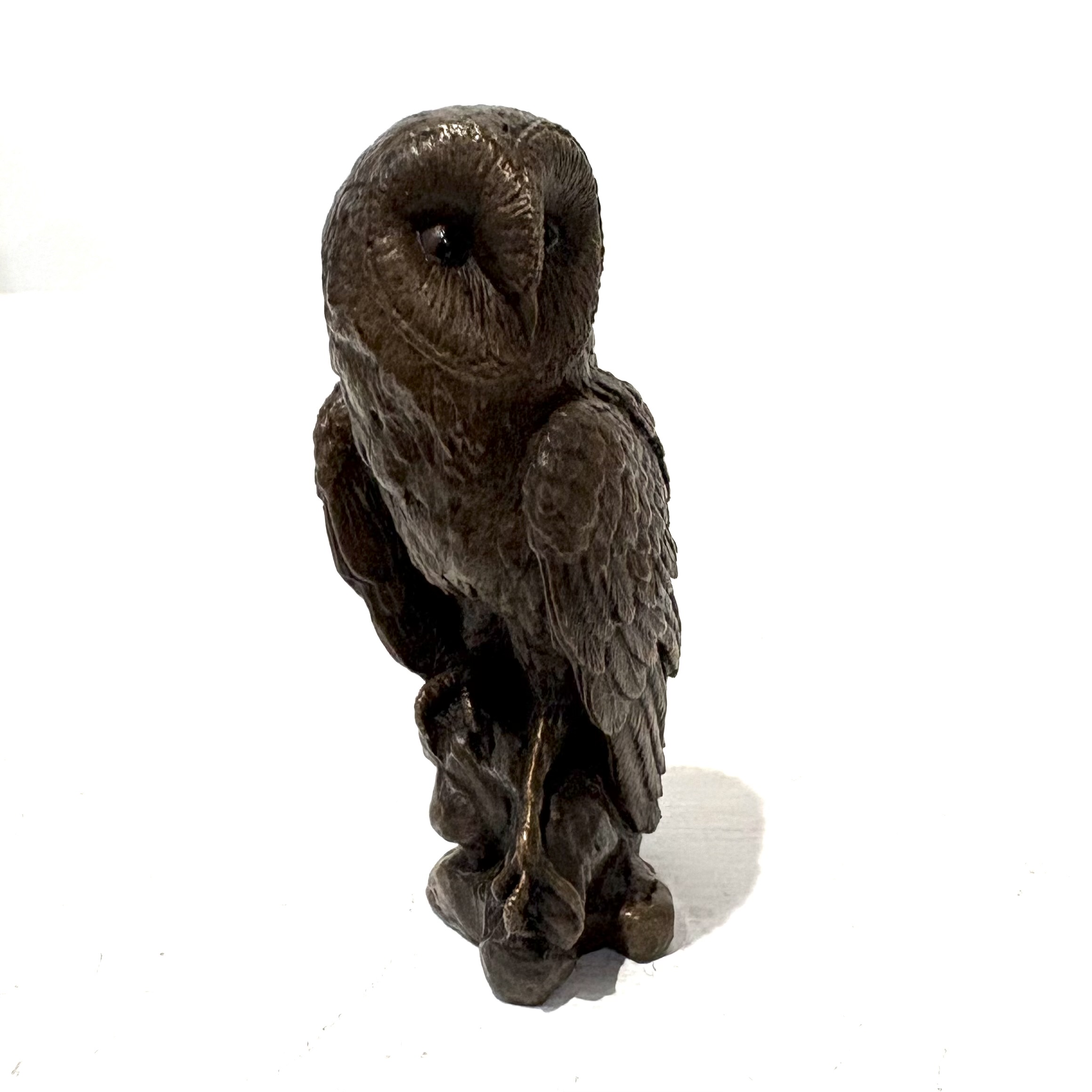 Barn Owl by Steve Langford. Small bronze bird sculpture of a barn owl.