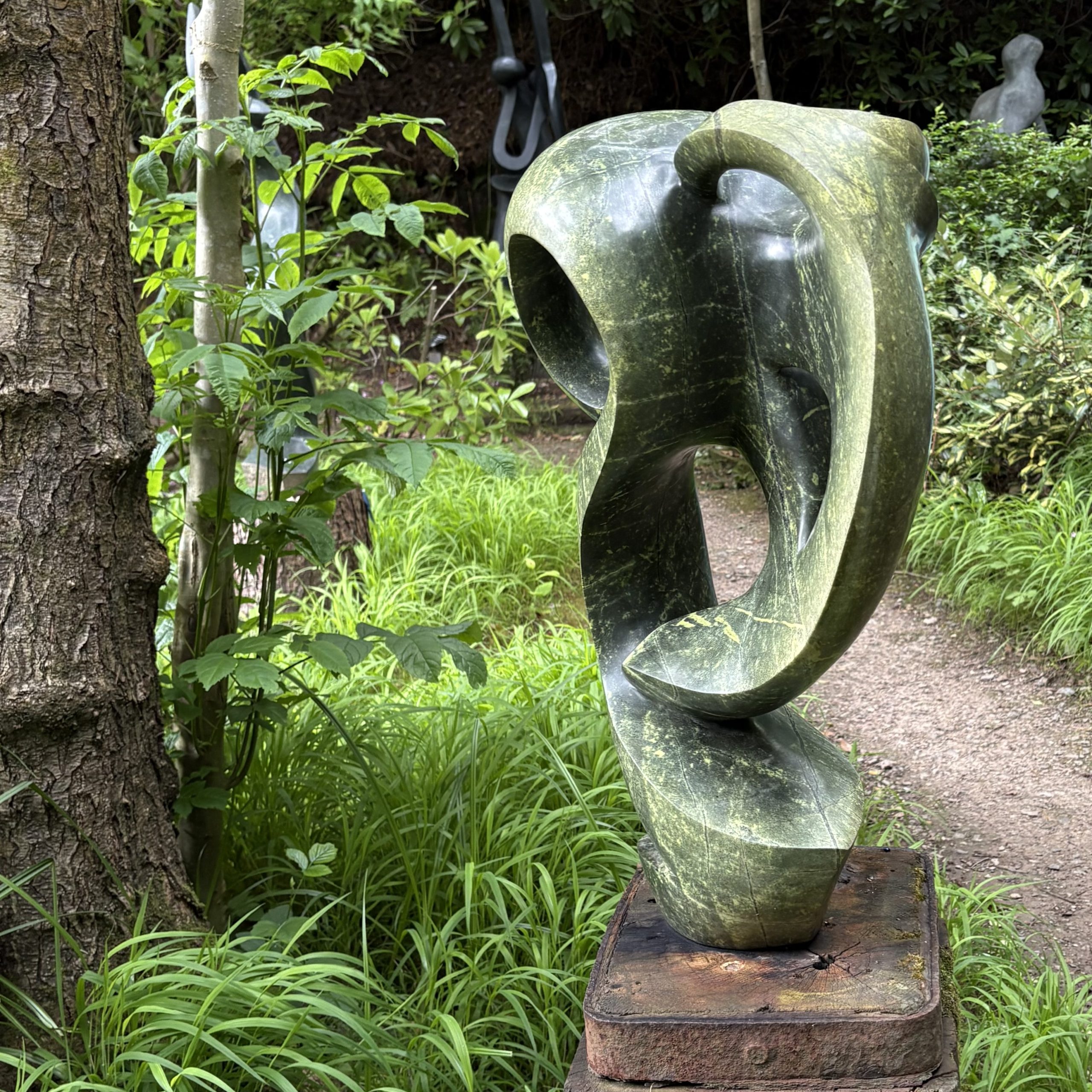 Meditating by Sylvester Samanyanga. Unique abstract avocado stone sculpture.