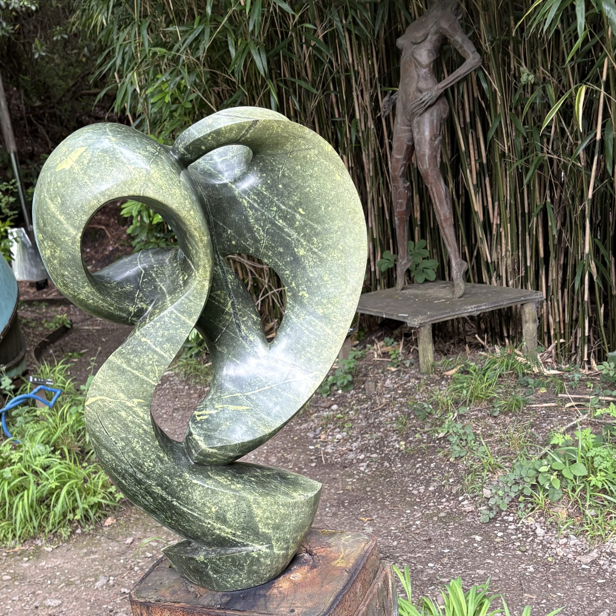 Meditating by Sylvester Samanyanga. Unique abstract avocado stone sculpture.