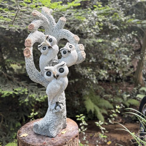 Together We Grow by Taurai Mupaso. Unique, large, Shona sculpture of three owls perched together in a tree. Carved from opal stone.