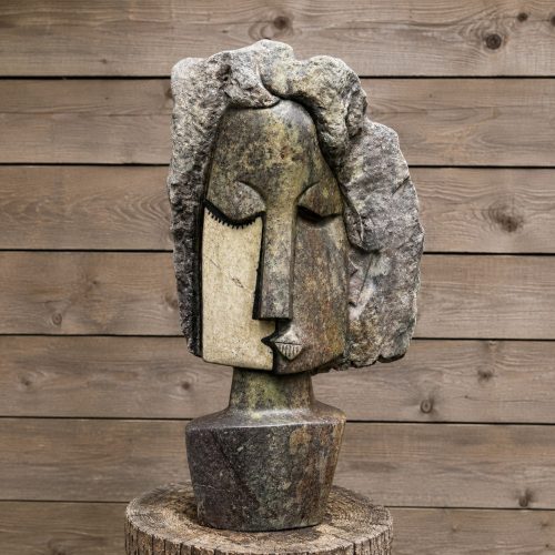 Memories by Taylor Nkomo. Unique Shona sculpture of an abstract bust made from cobalt and white dolomite stone. With smooth and rough contrasting surfaces.