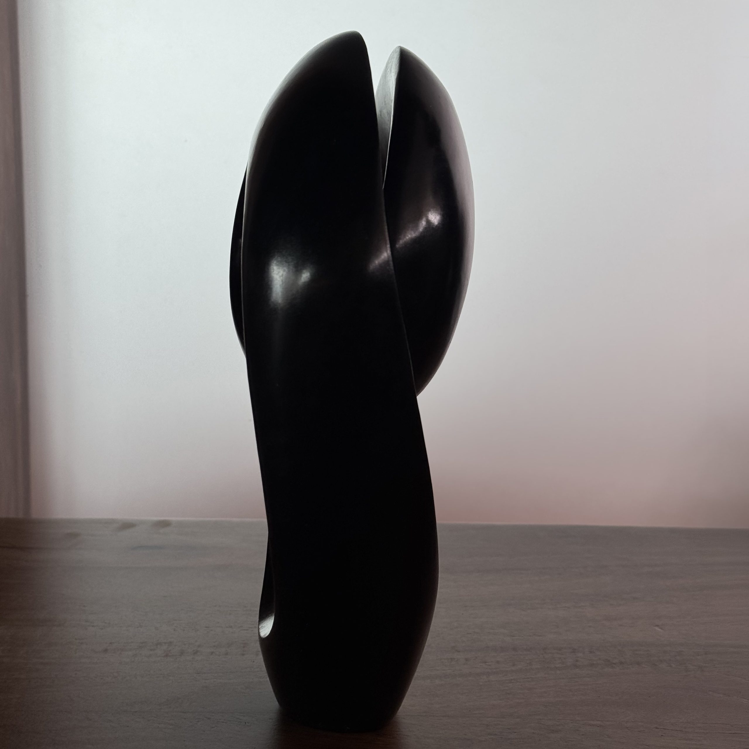 Close Race by Tonderai Sowa. Unique abstract sculpture, handcarved from Springstone in the traditional Shona style