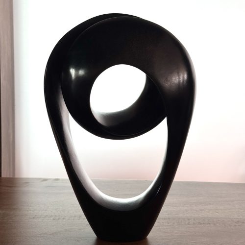 Close Race by Tonderai Sowa. Unique abstract sculpture, handcarved from Springstone in the traditional Shona style