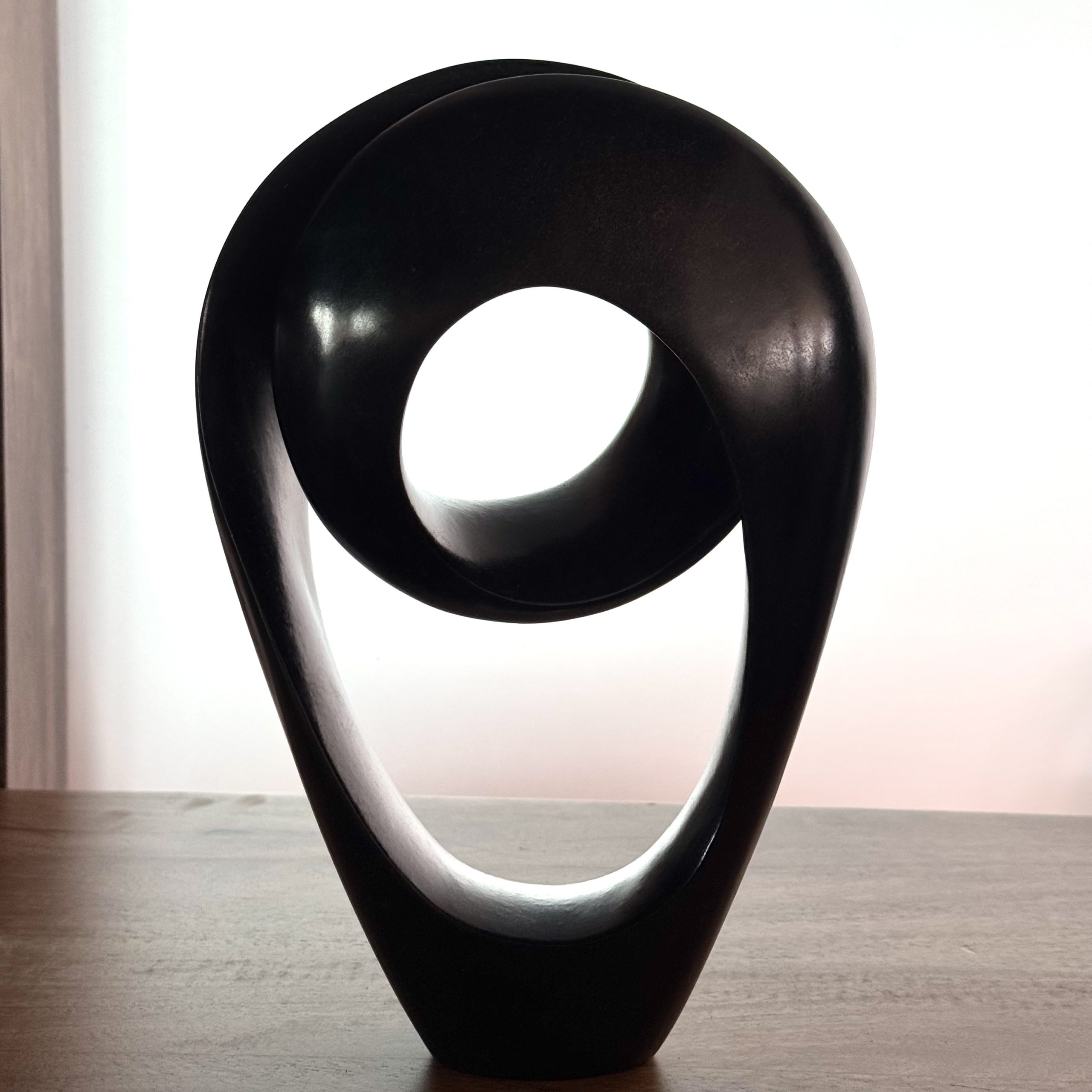 Close Race by Tonderai Sowa. Unique abstract sculpture, handcarved from Springstone in the traditional Shona style