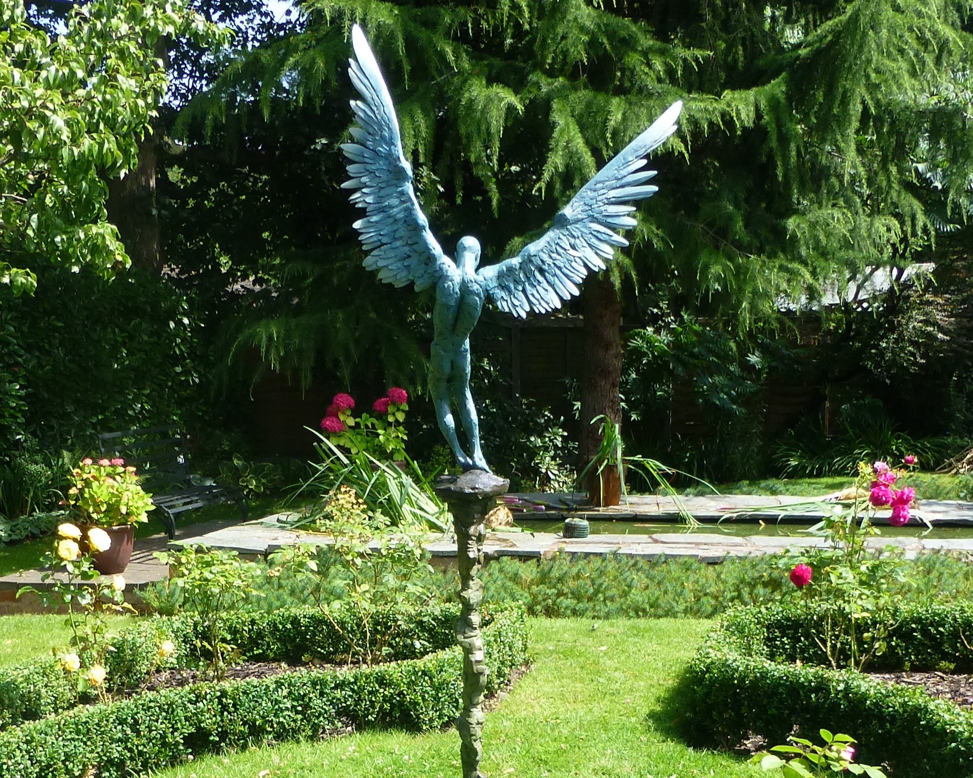 Icarus X by Nicola Godden. Large bronze mythical figure sculpture depicting Icarus, the figure from Greek mythology who dared to fly too close to the sun.
