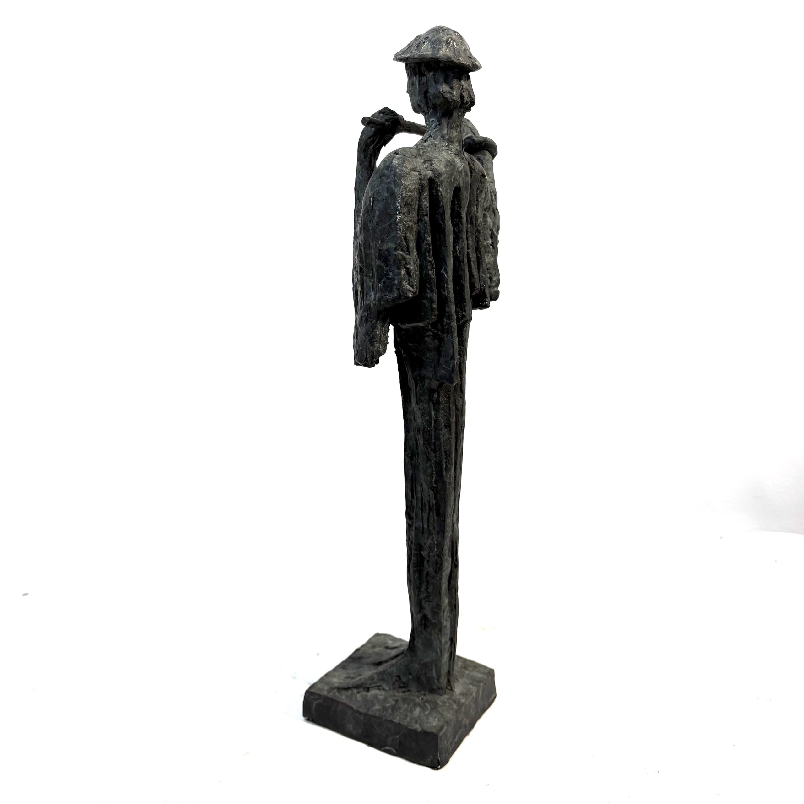 Flautist Maquette By Sean Crampton. Flautist Maquette By Sean Crampton. Table-top sized bronze sculpture of a man playing the flute. He wears a pointed hat.