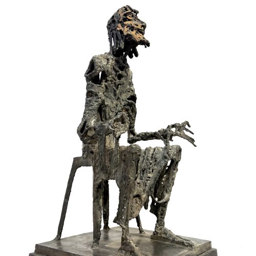 Judas by Sean Crampton. Table-top size bronze figurative sculpture of a seated man, Judas. Expressionistic in style.