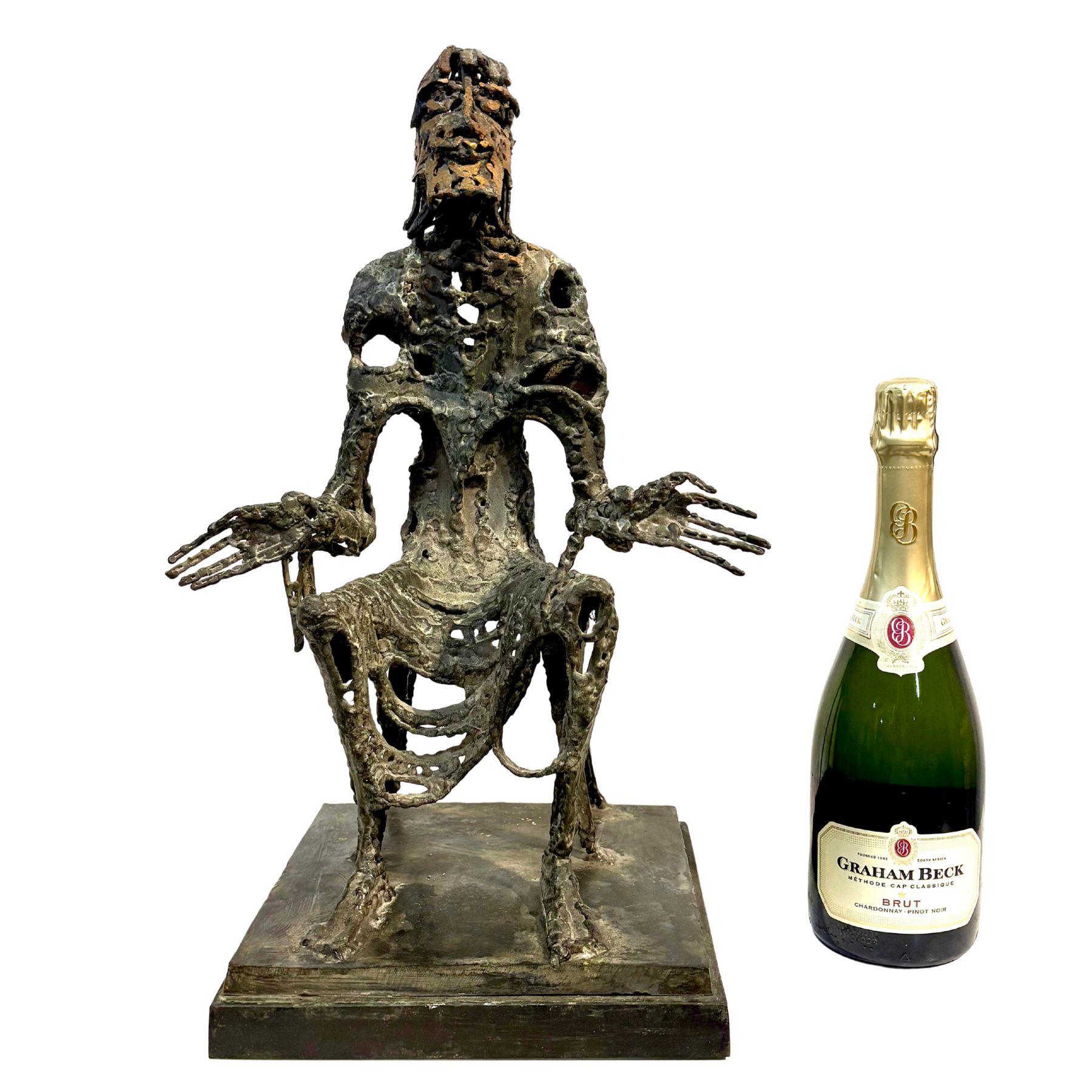 Judas by Sean Crampton. Table-top size bronze figurative sculpture of a seated man, Judas. Expressionistic in style.