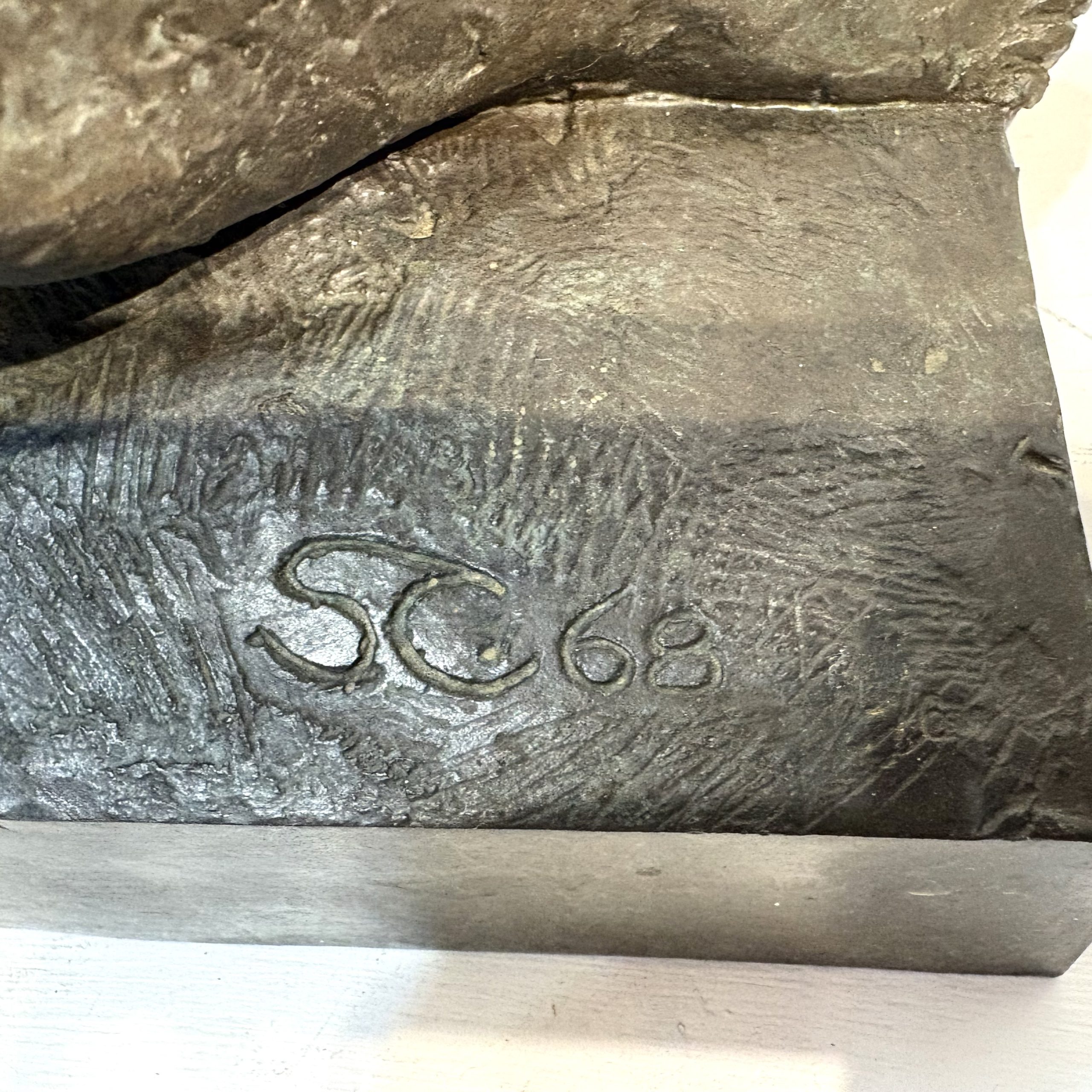 The Lovers by Sean Crampton. Table-top sized bronze sculpture of a nude male/female couple entwined