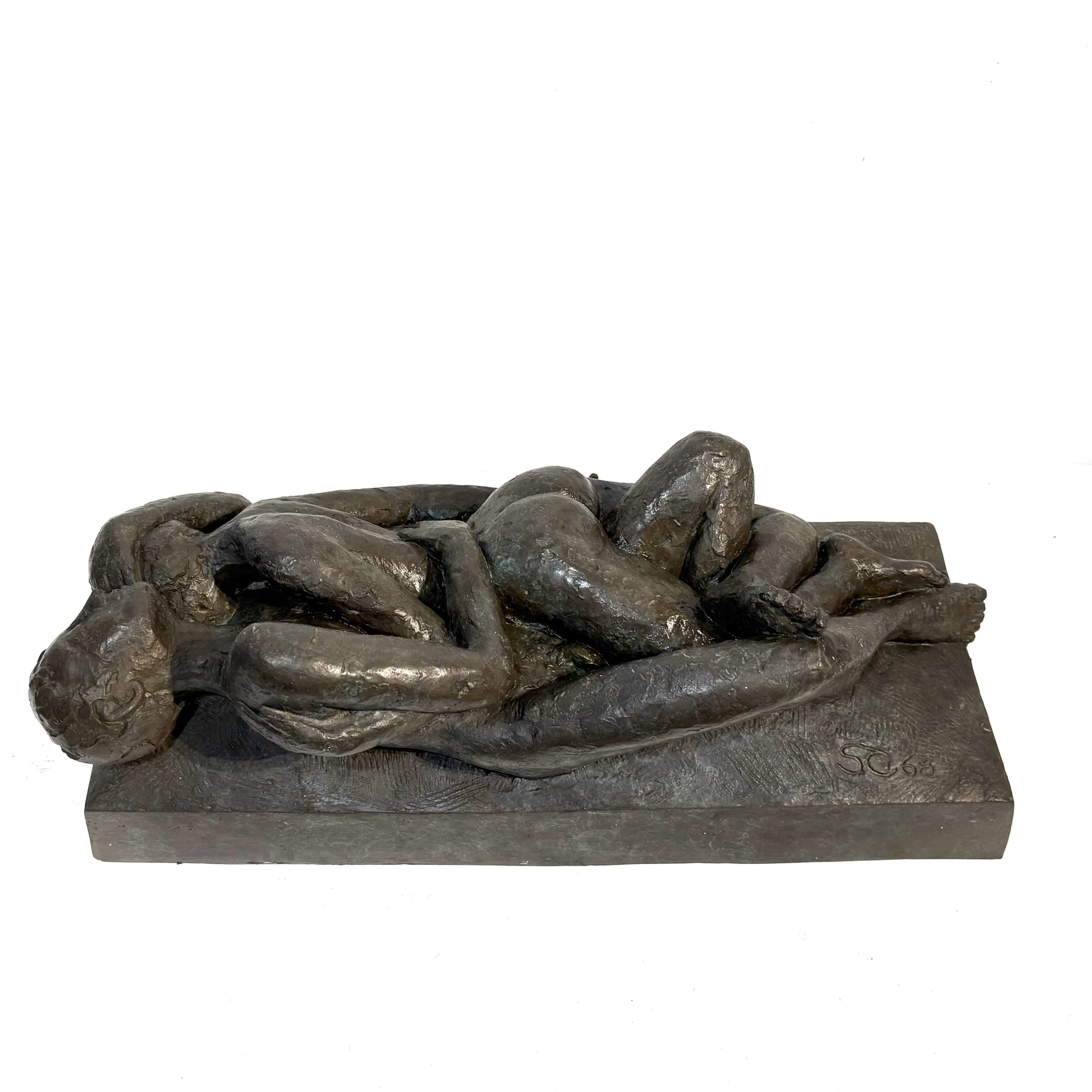 The Lovers by Sean Crampton. Table-top sized bronze sculpture of a nude male/female couple entwined