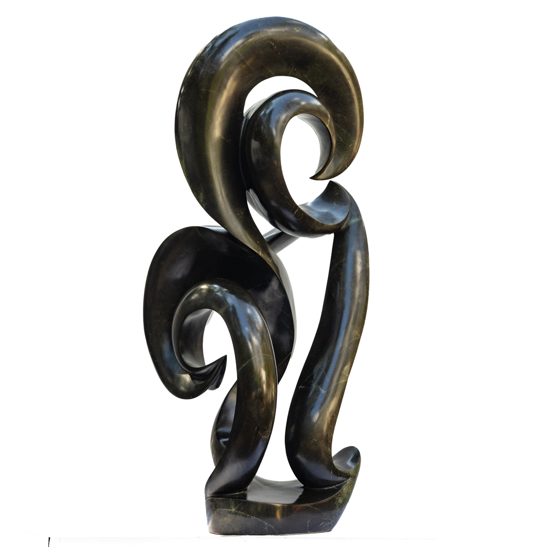 Cherished by James Phiri, a Shona Avocado stone sculpture of a tall abstract shape that curls and twists as it rises.