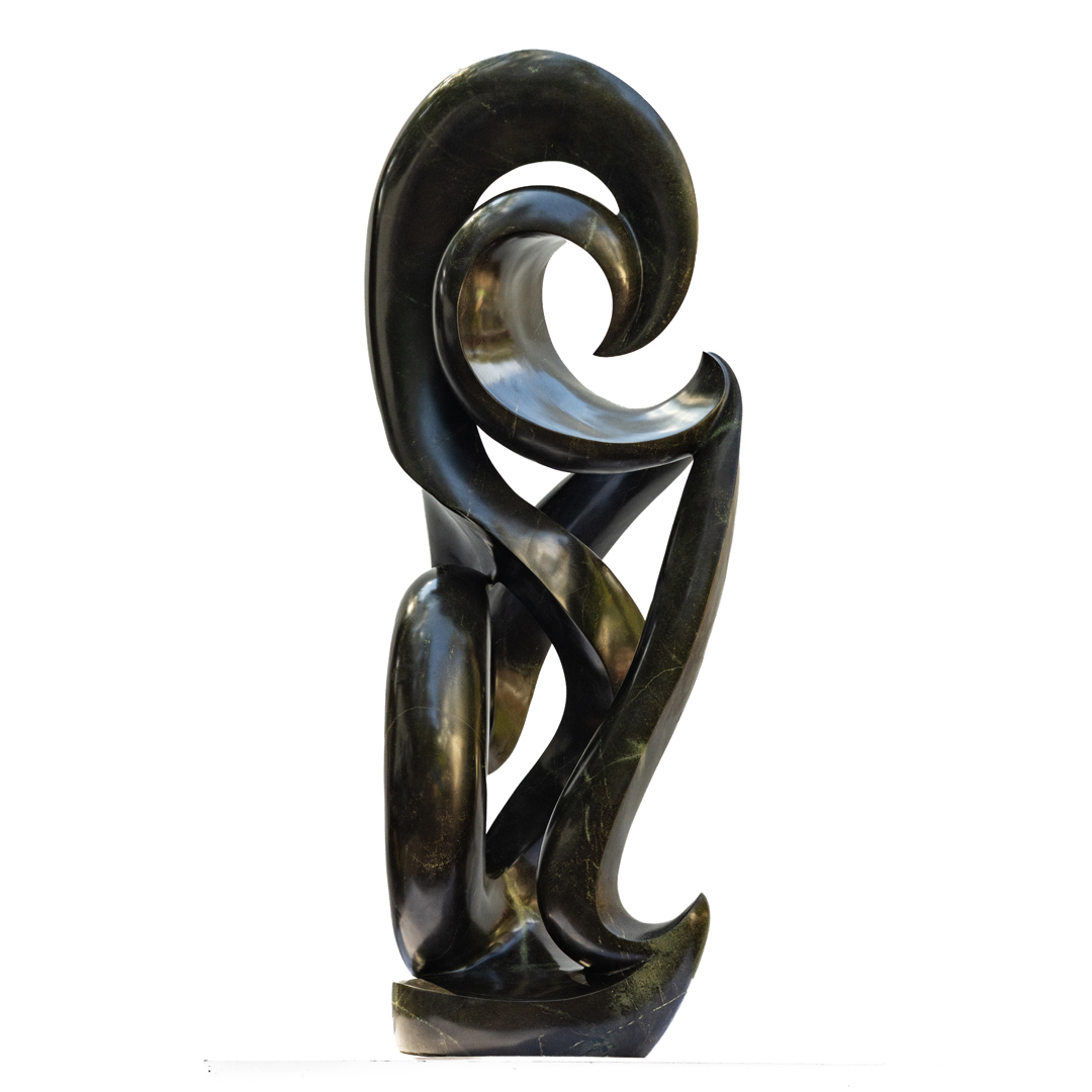 Cherished by James Phiri, a Shona Avocado stone sculpture of a tall abstract shape that curls and twists as it rises.