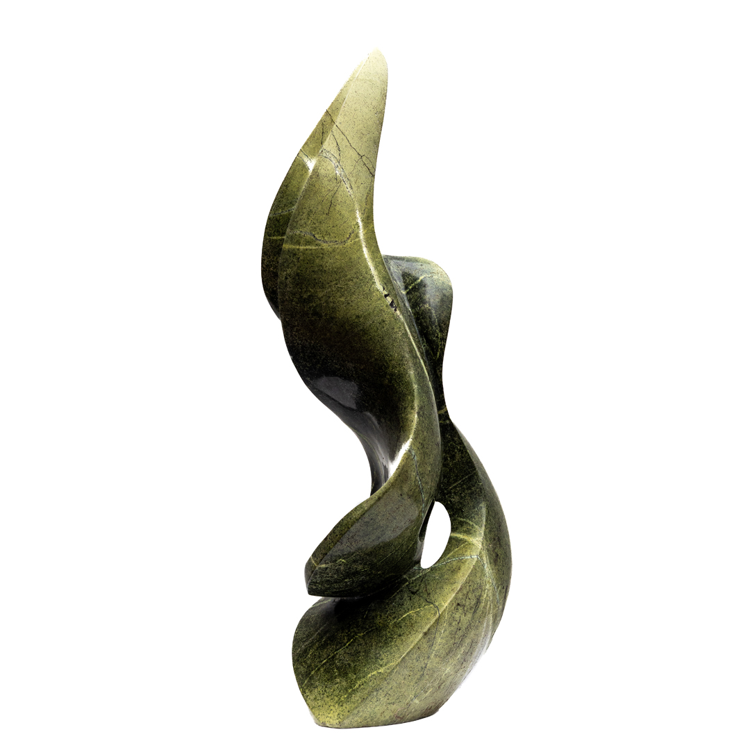 Embrace by Kufa McDonald. Unique hand carved, table-top sized, abstract Shona sculpture made from avocado stone in a flame like swirling form.