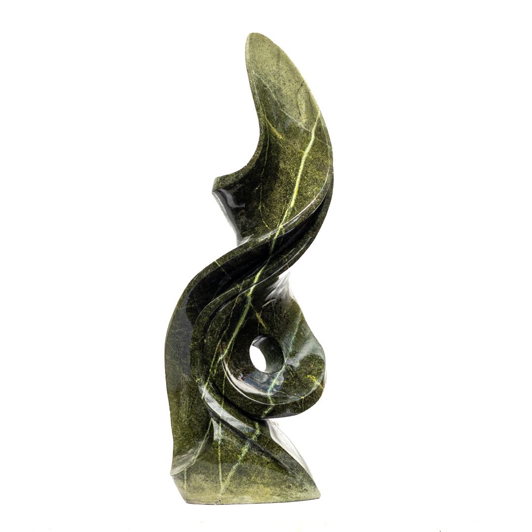 Embrace by Kufa McDonald. Unique hand carved, table-top sized, abstract Shona sculpture made from avocado stone in a flame like swirling form.