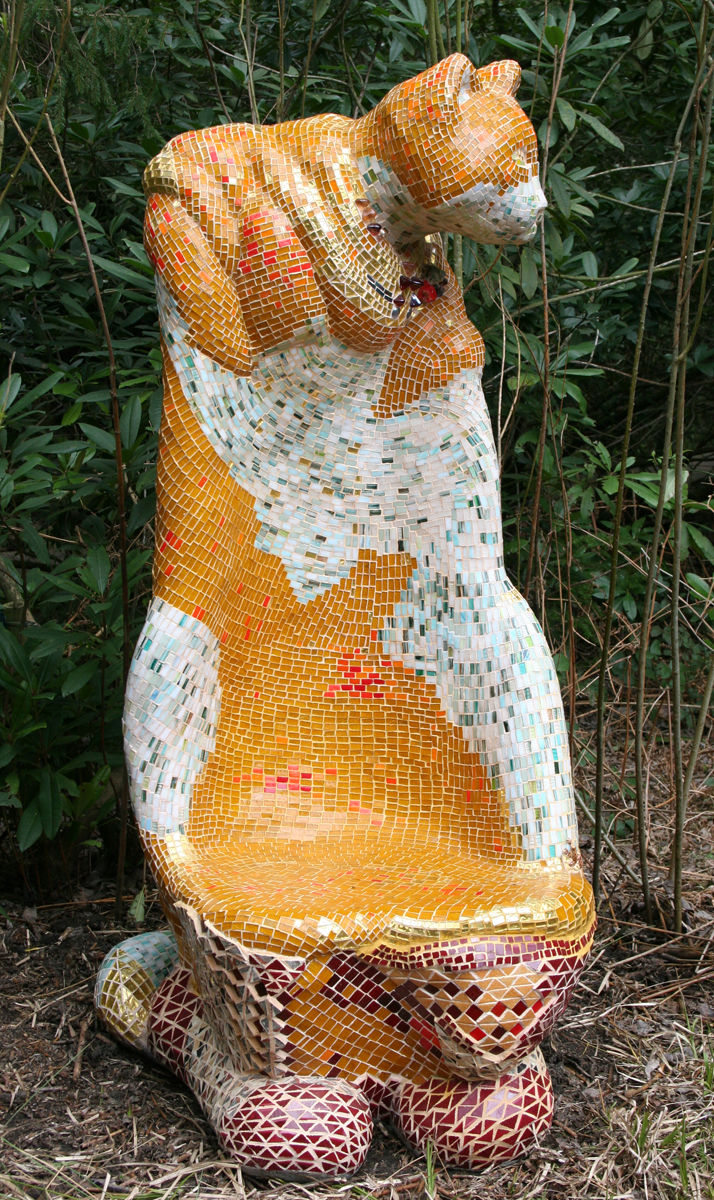 Single Garden Seat Created With Mosaic Covered Concrete Resembling a Cat