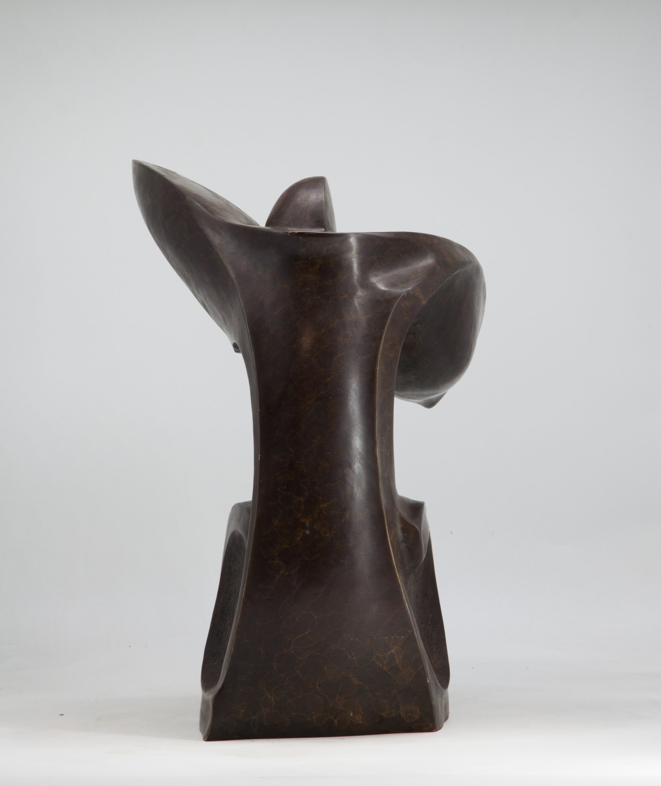 An abstract bronze sculpture.