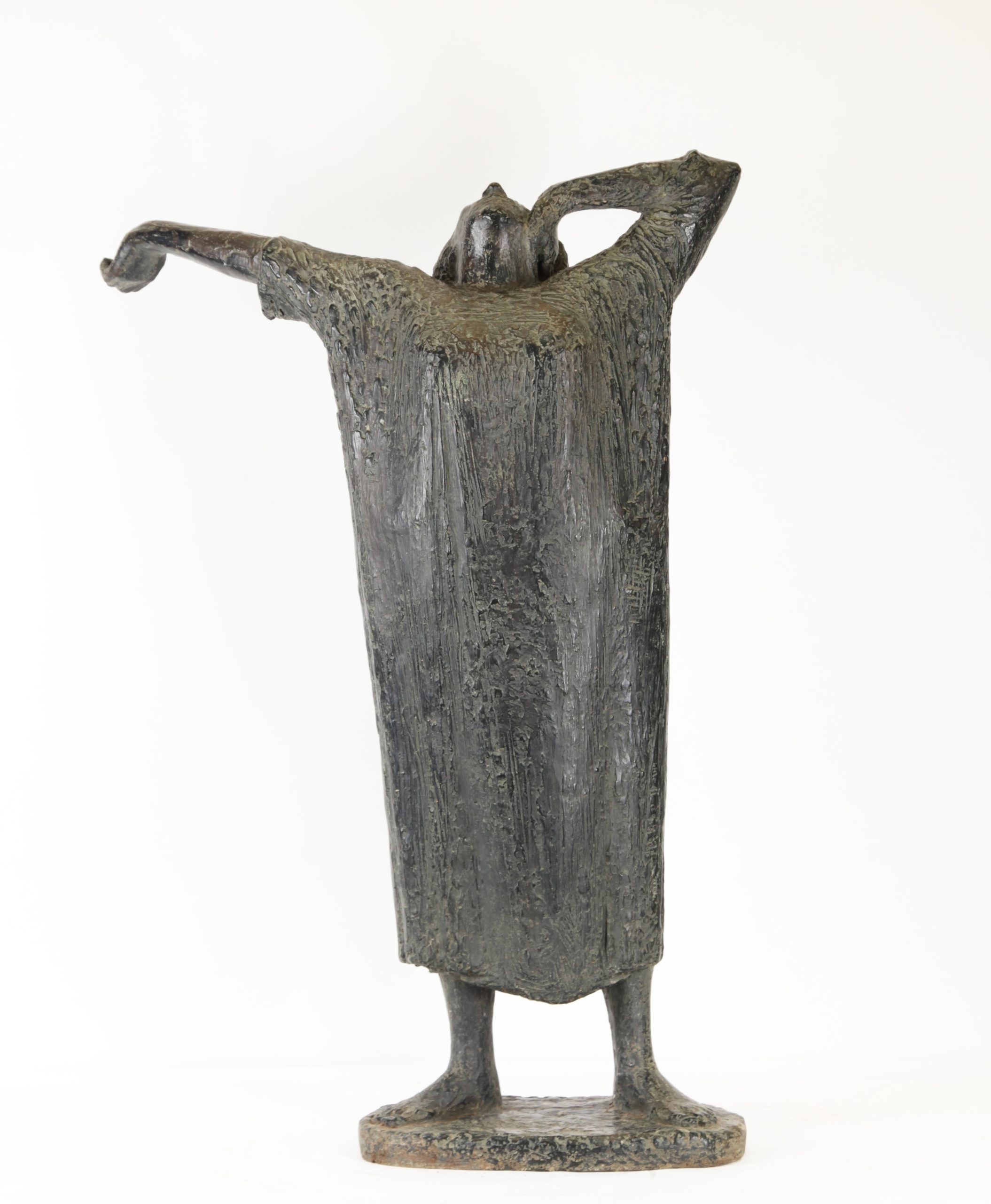 Charming, simplistic bronze sculpture of a woman waking up and stretching, wearing her nightdress. One arm is out to the side, the other resting on her head which is held back while she yawns