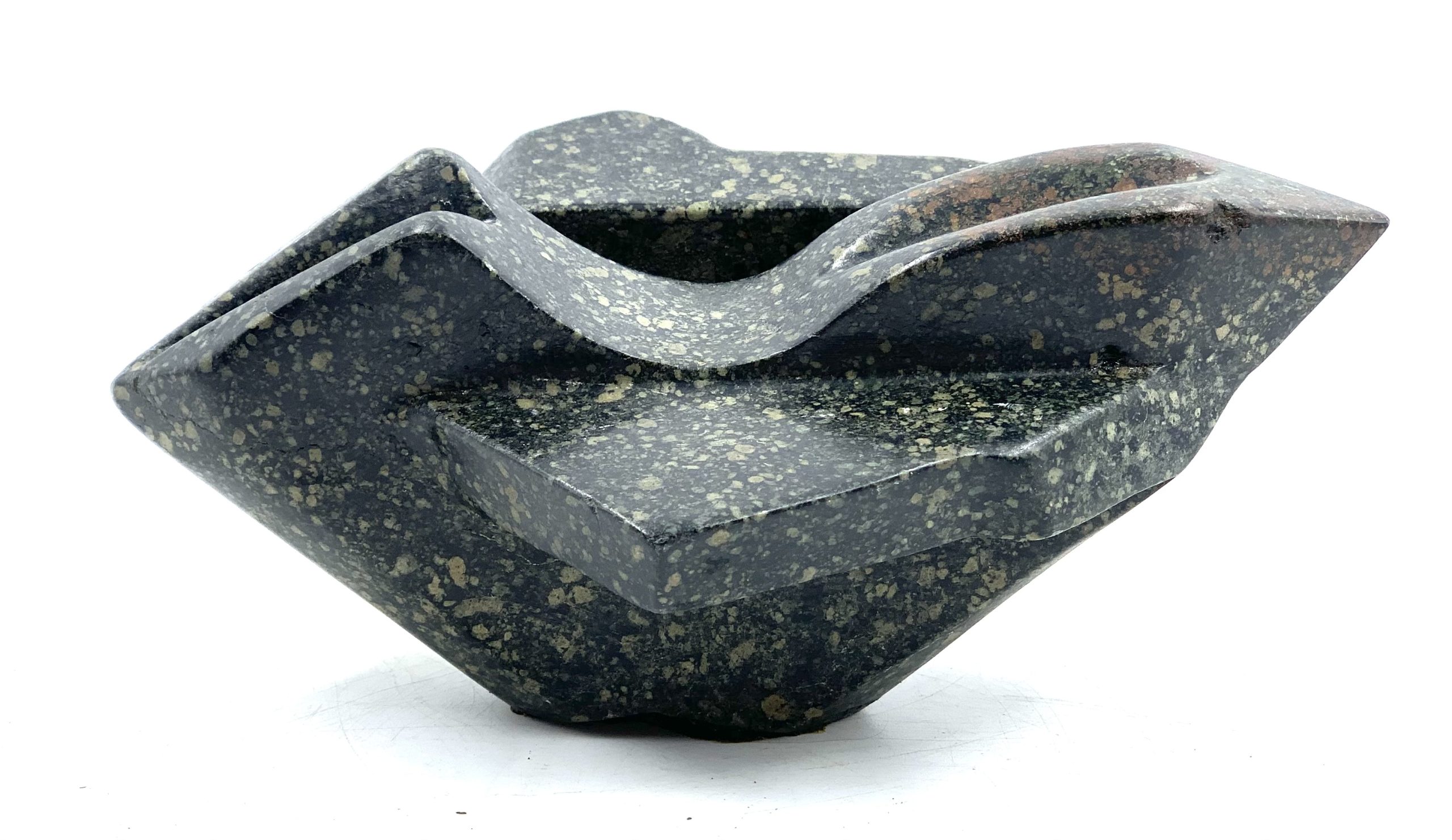 An abstract marble sculpture.