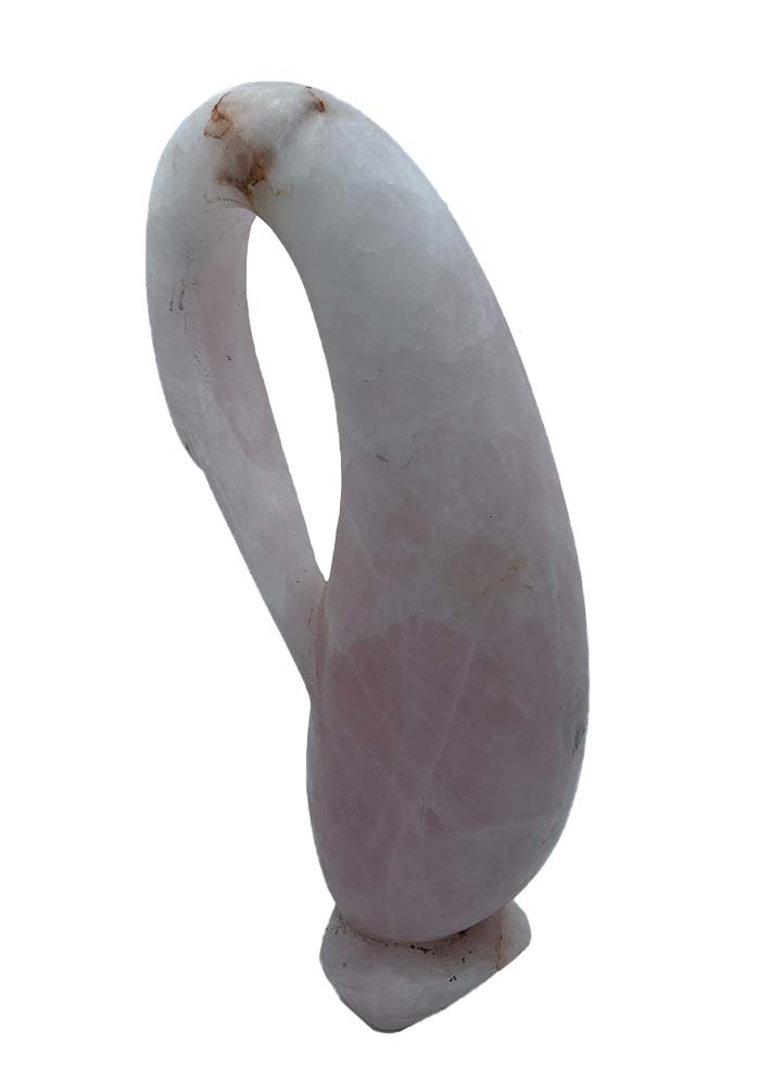 Abstract Simplistic Shona Sculpture of a Bird with its neck curved in. The carved stone is light pink and white in colour.