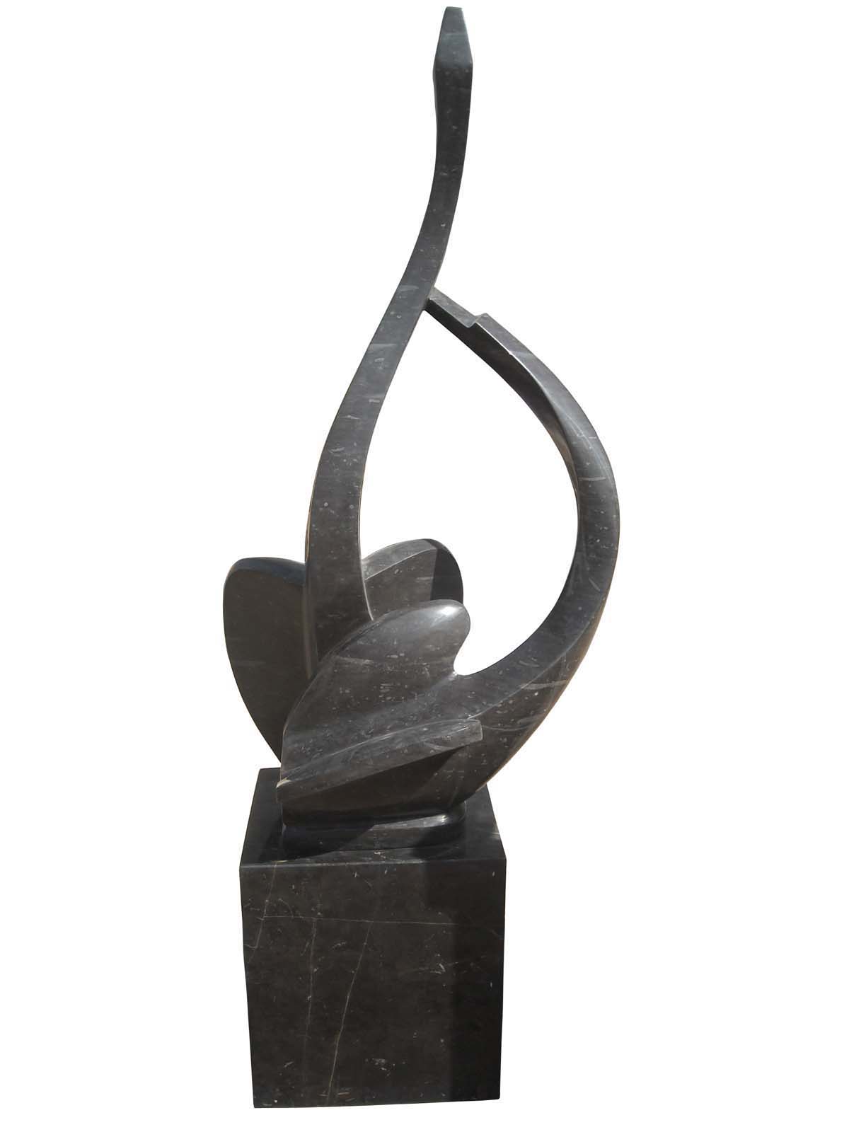 A impressionism marble sculpture of two abstract birds paired together.