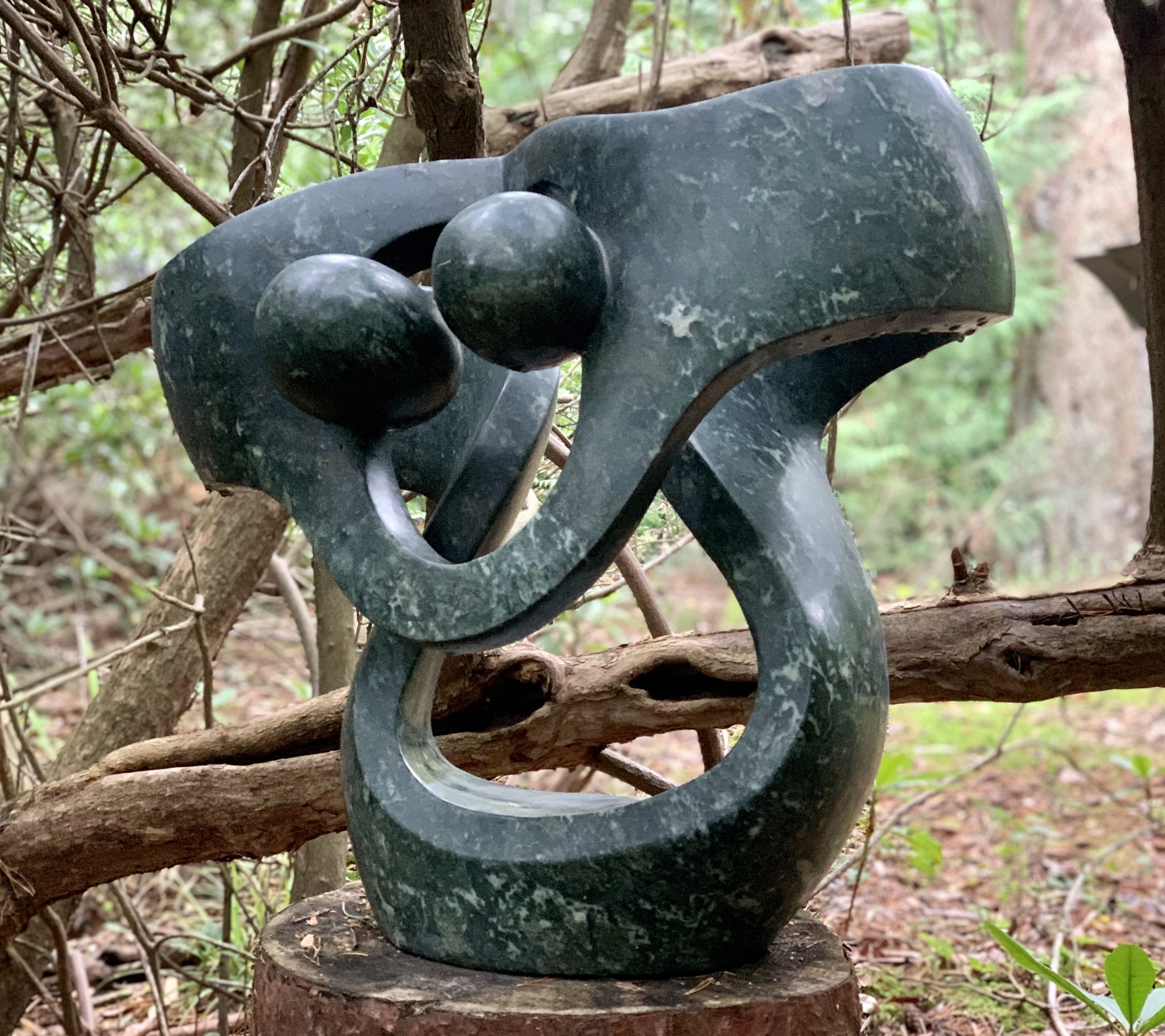 Abstract Zimbabwean Shona Sculpture of a couple Dancing
