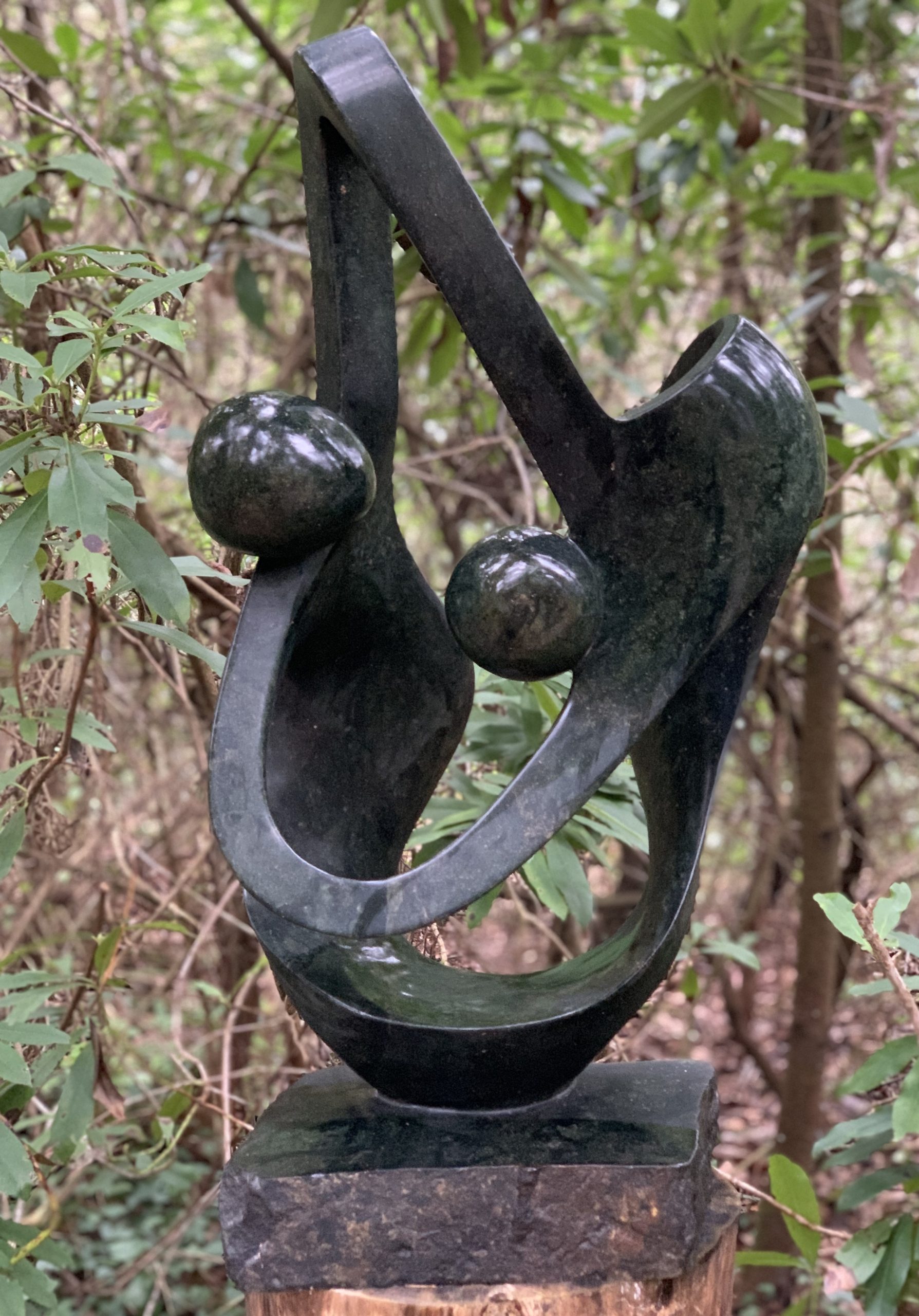 Abstract Zimbabwean Shona Sculpture of a couple Dancing