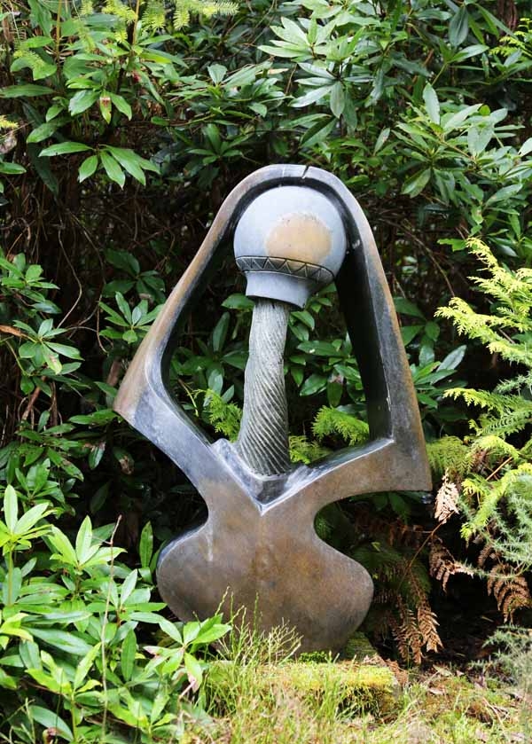 A contemporary stone sculpture of a large intricate nutcracker.