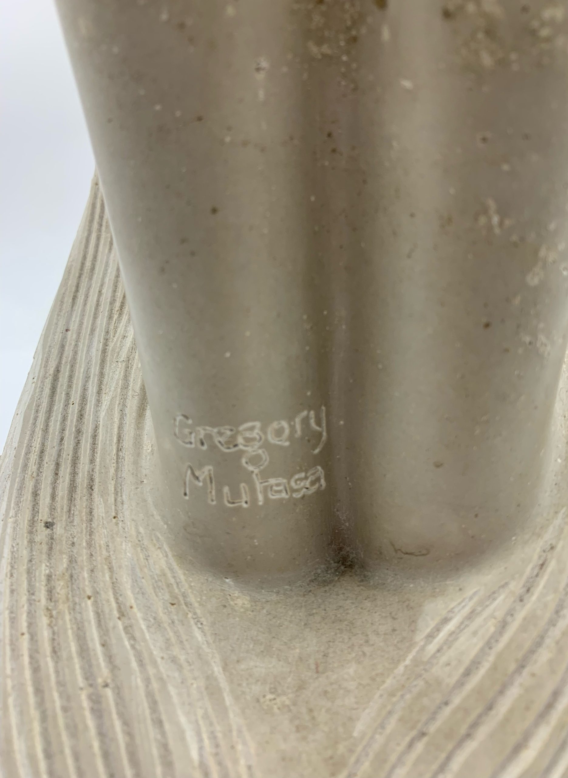 Zimbabwean Shona Sapolite Stone Sculpture of a Woman Washing Her Hair
