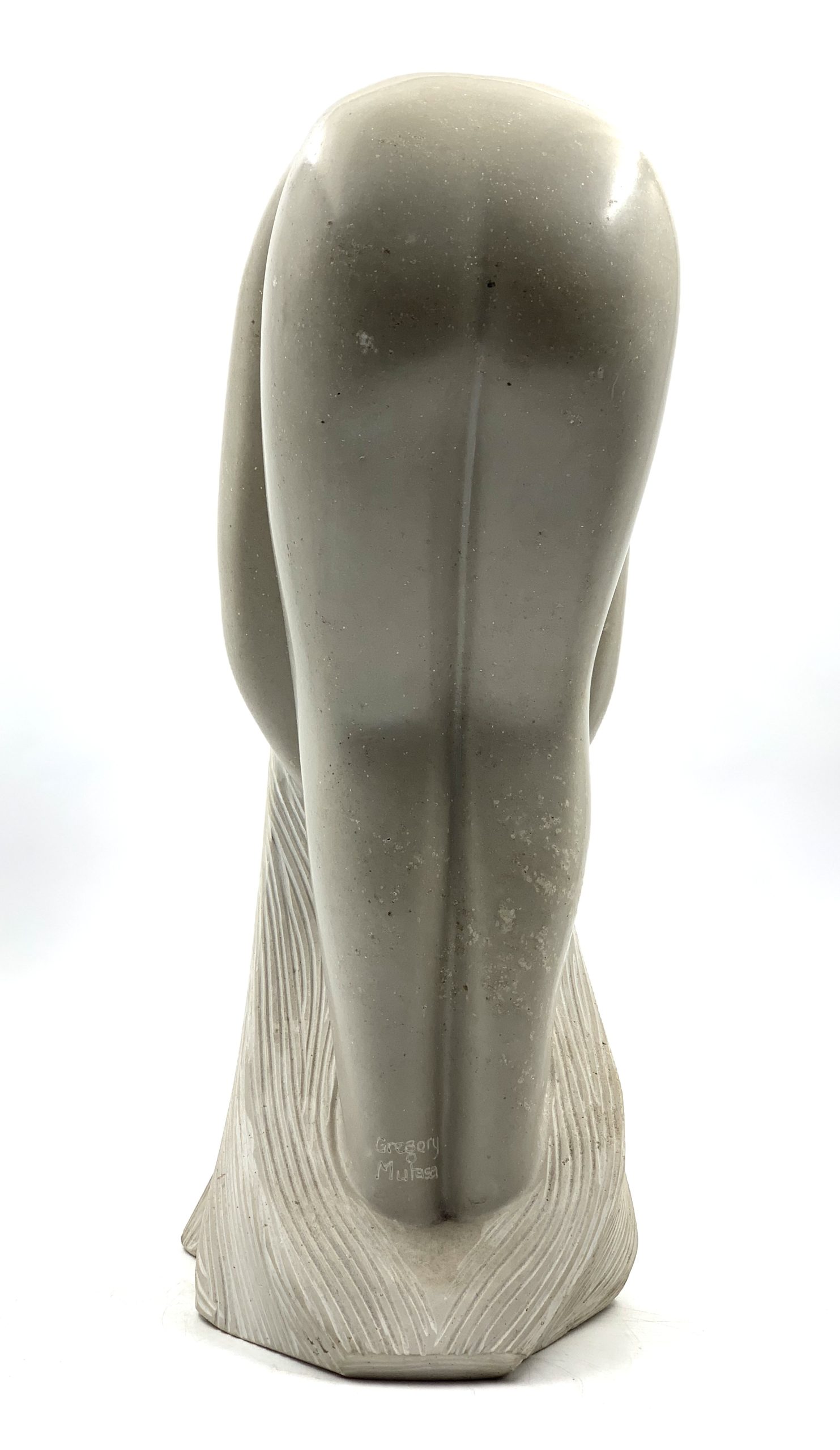 Zimbabwean Shona Sapolite Stone Sculpture of a Woman Washing Her Hair