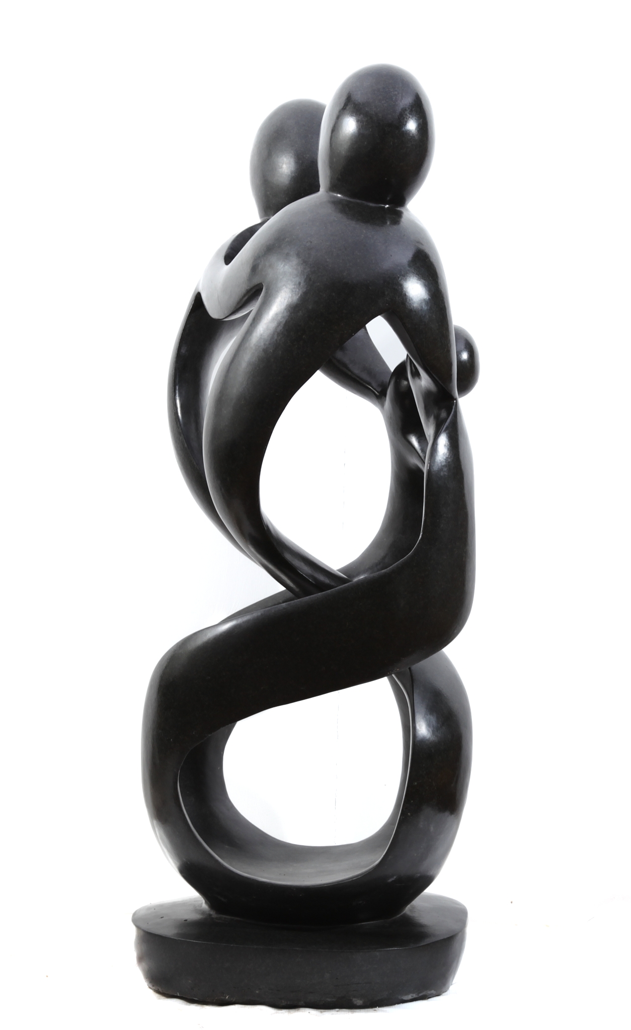 Large Springstone Carved Shona Sculpture of a Family of Four (2 Adults and 2 children)