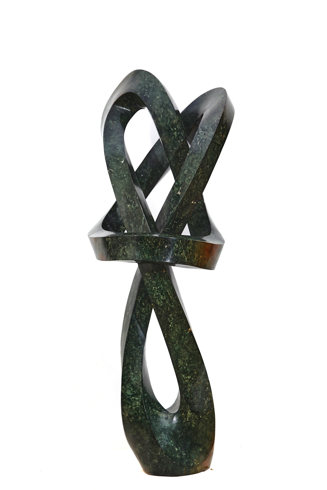 A Shona opal stone sculpture of a twisting and curving shape.