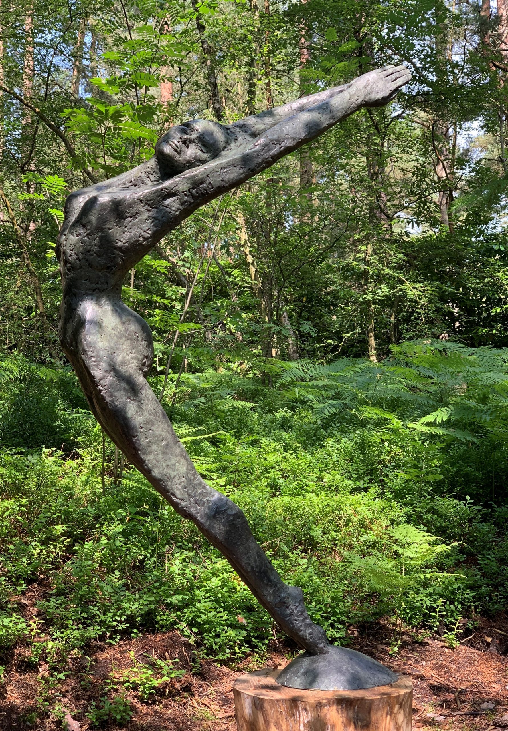Figurative Bronze Sculpture of a Woman with Arms in the Air, Leaning Back