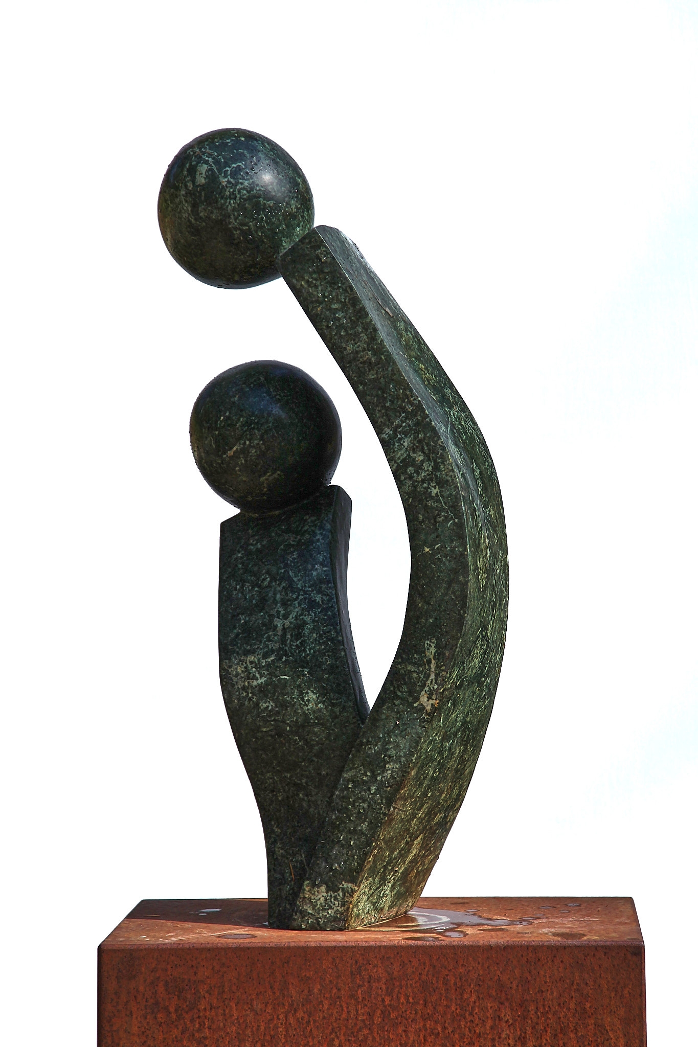 An abstract Shona sculpture showing 2 figures.
